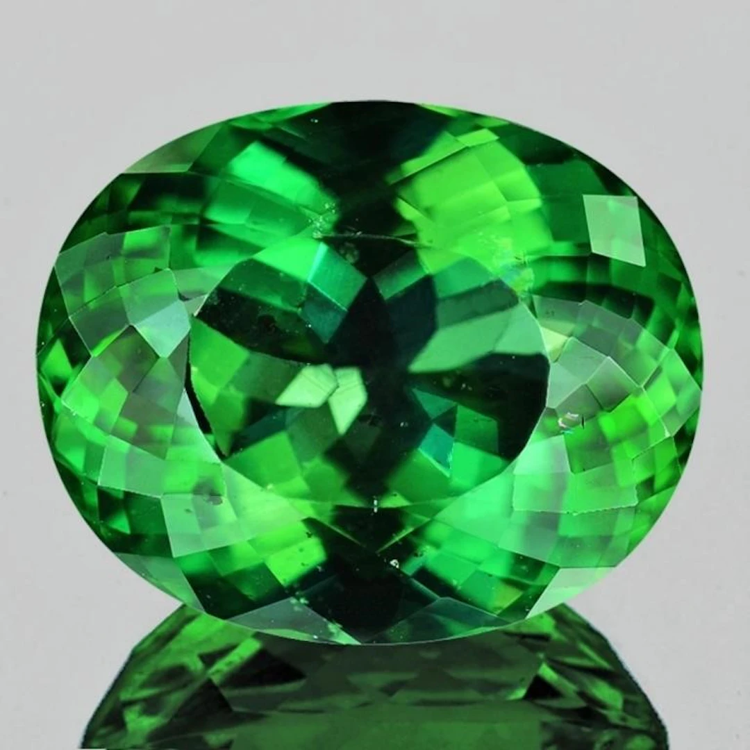 Natural Intense Green Oval Apatite (Flawless-VVS)