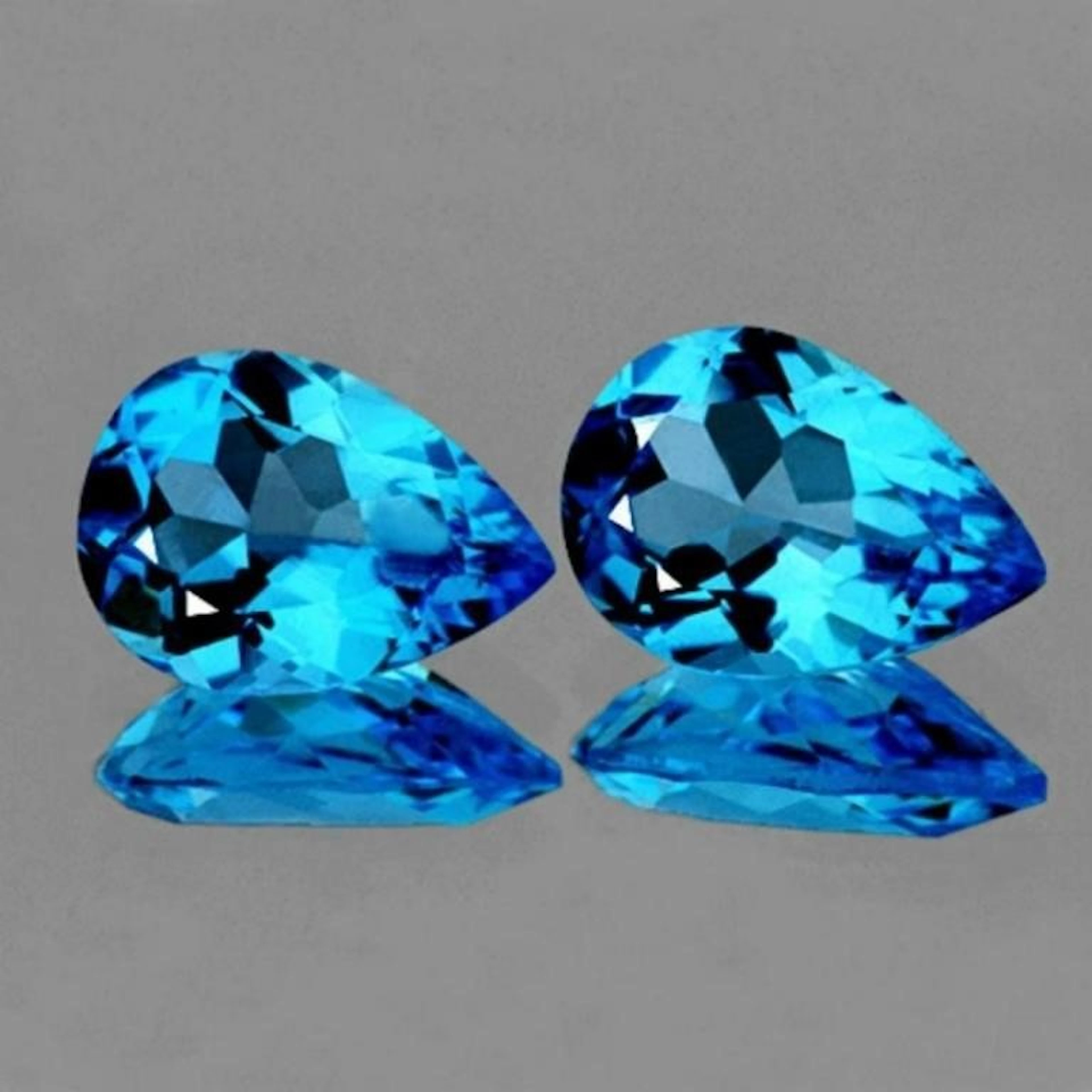 Natural Intense AAA Swiss Blue Topaz Pair 10x7 MM