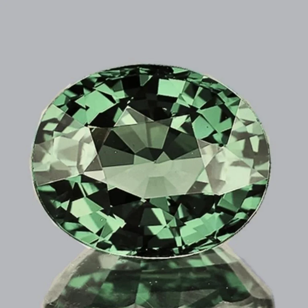 Natural Oval Green Sapphire {Flawless-VVS}