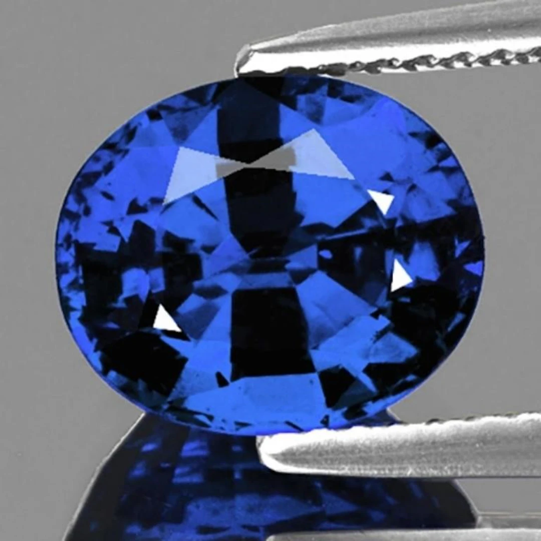 Natural Oval Royal Blue Sapphire { Flawless-VVS}