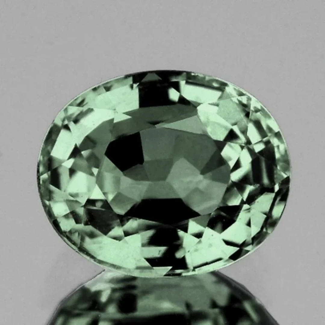 Natural Oval Green Sapphire {Flawless-VVS}