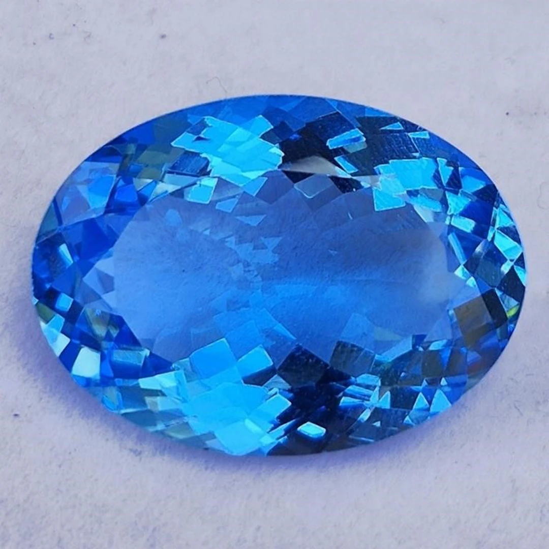 Natural Intense Swiss Blue Topaz {Flawless-VVS}