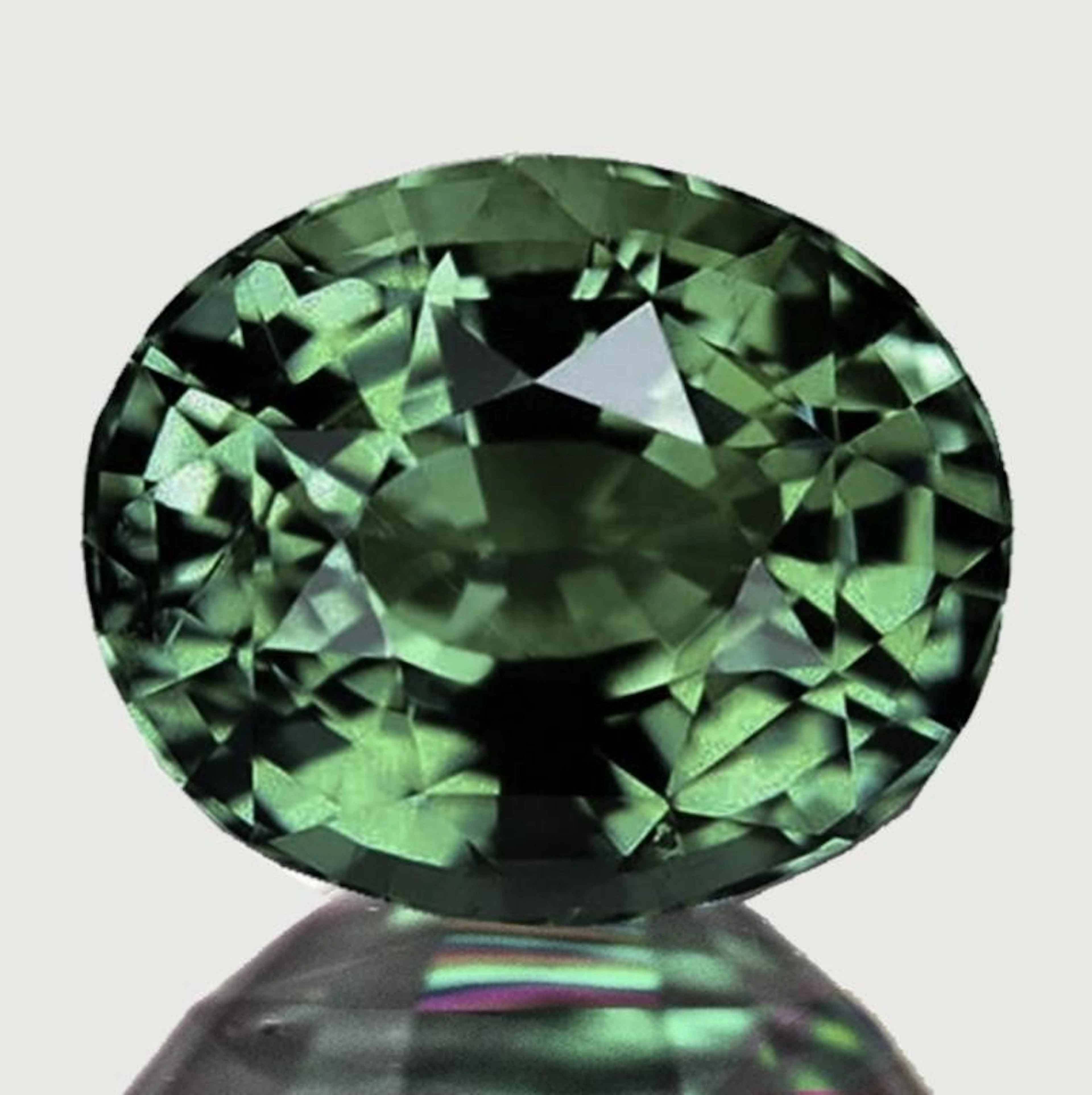 Natural Oval Green Sapphire {Flawless-VVS}