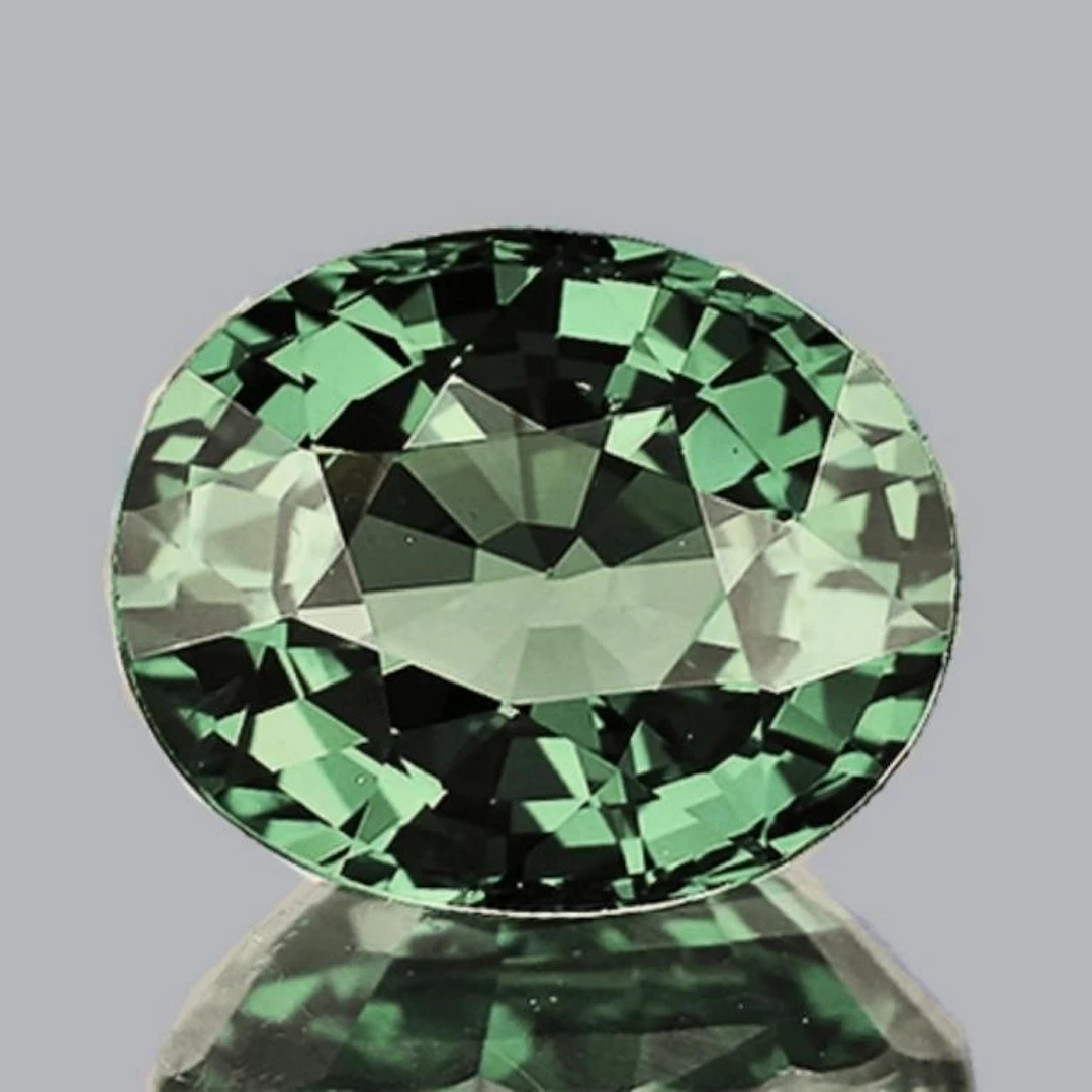 Natural Oval Green Sapphire {Flawless-VVS}