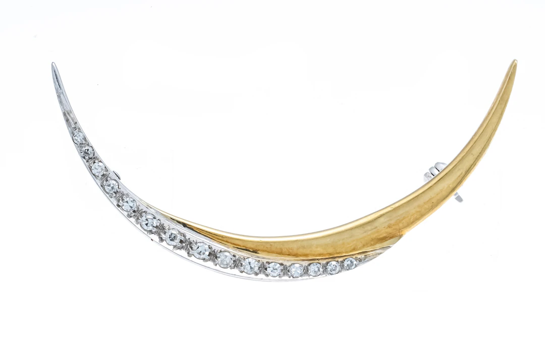 Sichelförmige Diamant-Brosche GG/