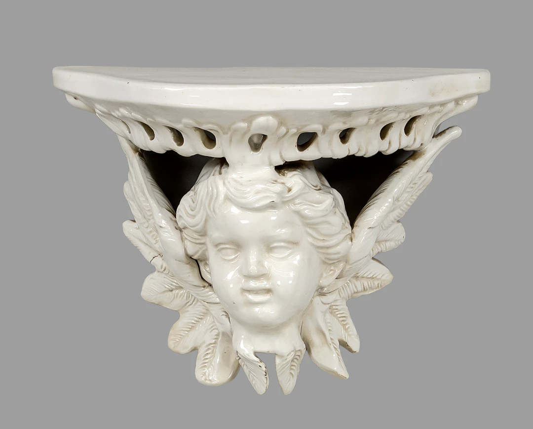 Konsole mit Putto, 19./20. Jh., M