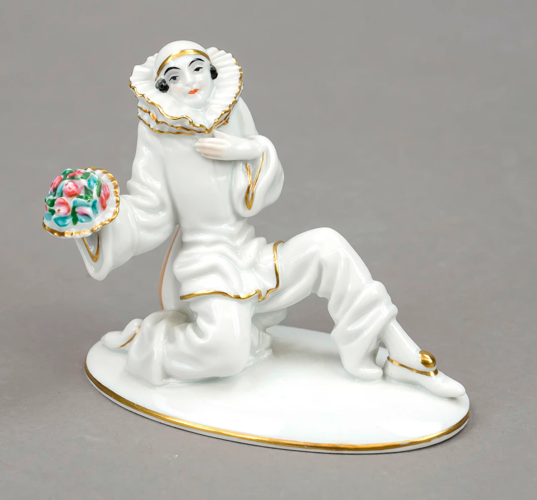 Knieender Pierrot mit Blumenstrau