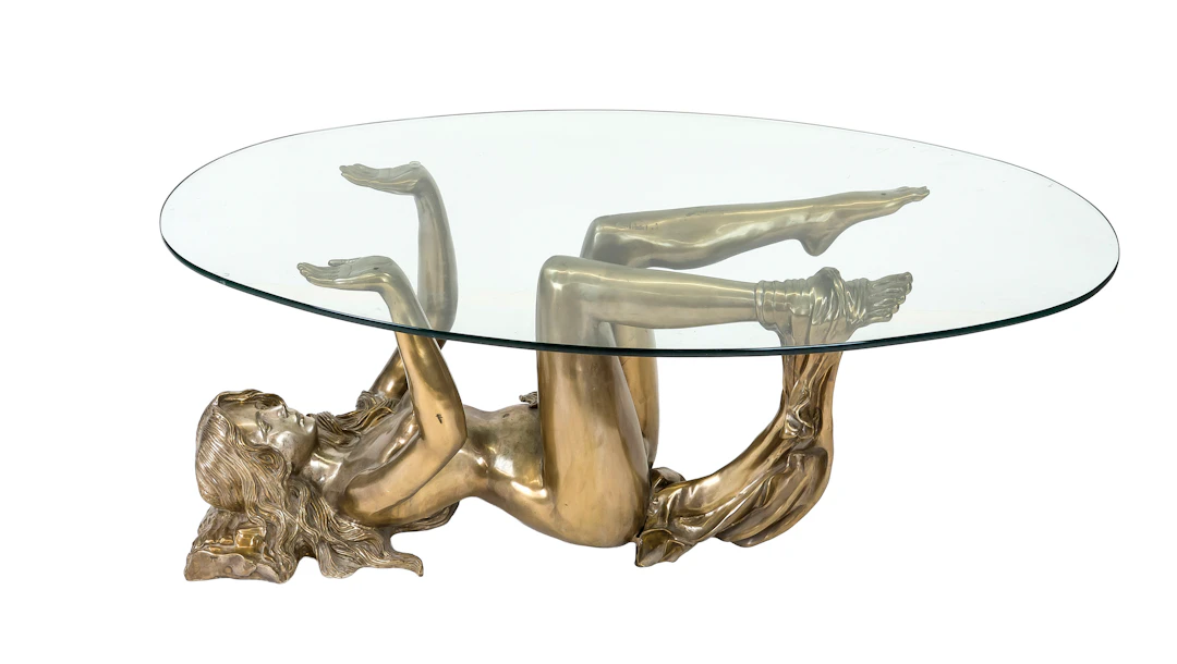 Glastisch mit figürlichem Unterba