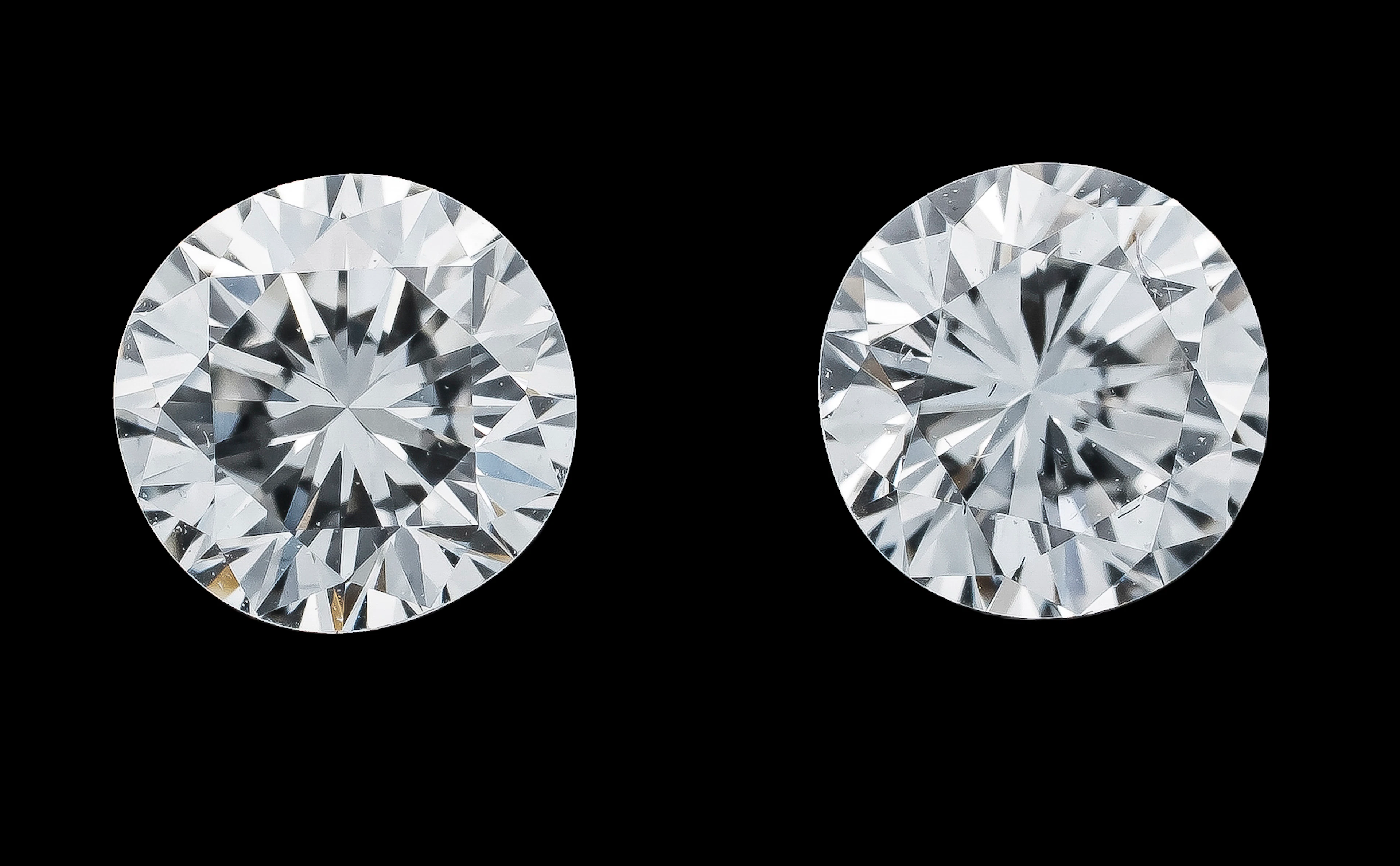2 Brillanten, zus. 0,60 ct TW/Lup