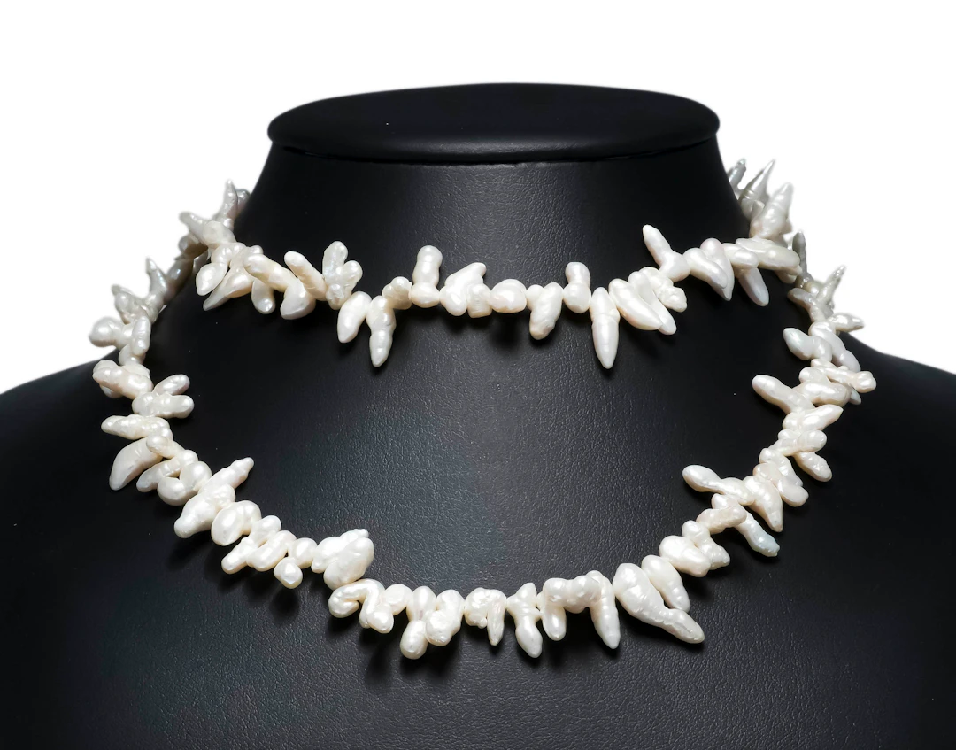 Endlos Drachenzahnperlen-Collier