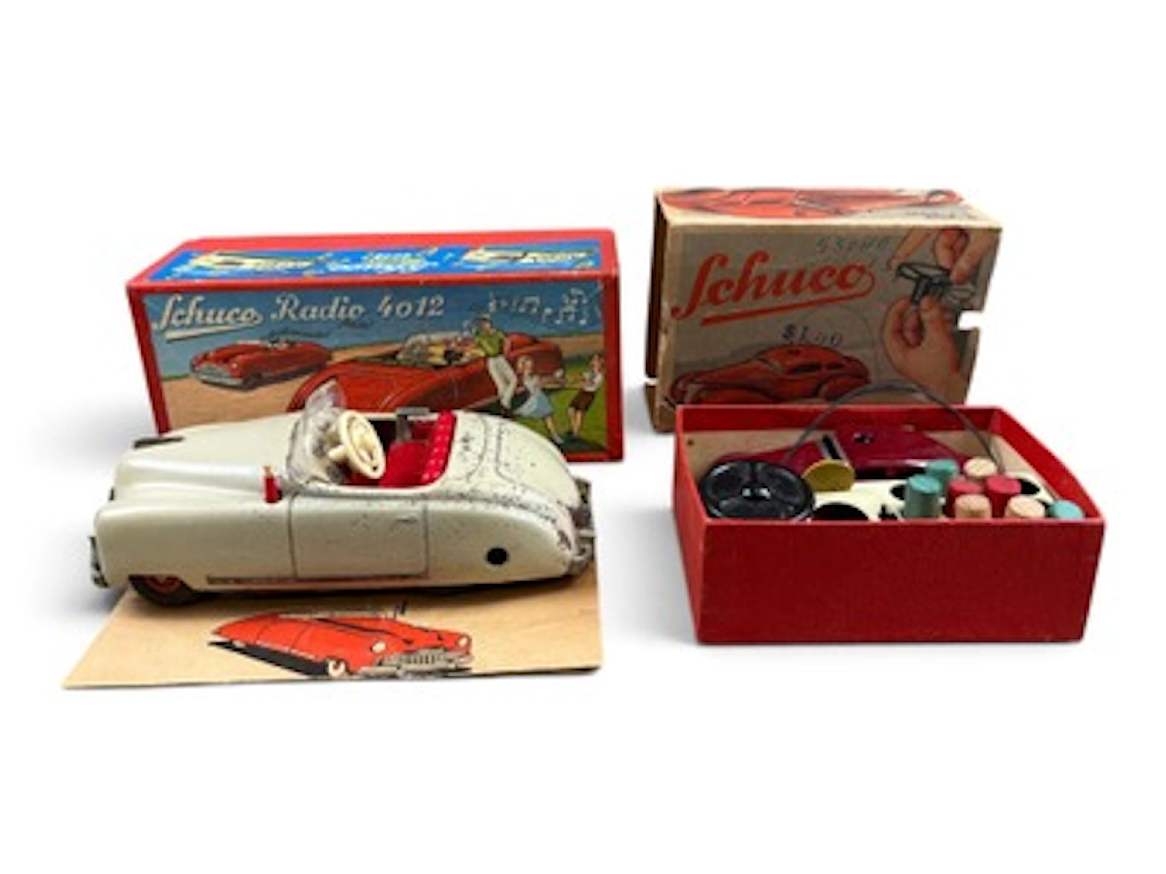 (2) Boxed Schuco Wind-Up Cars