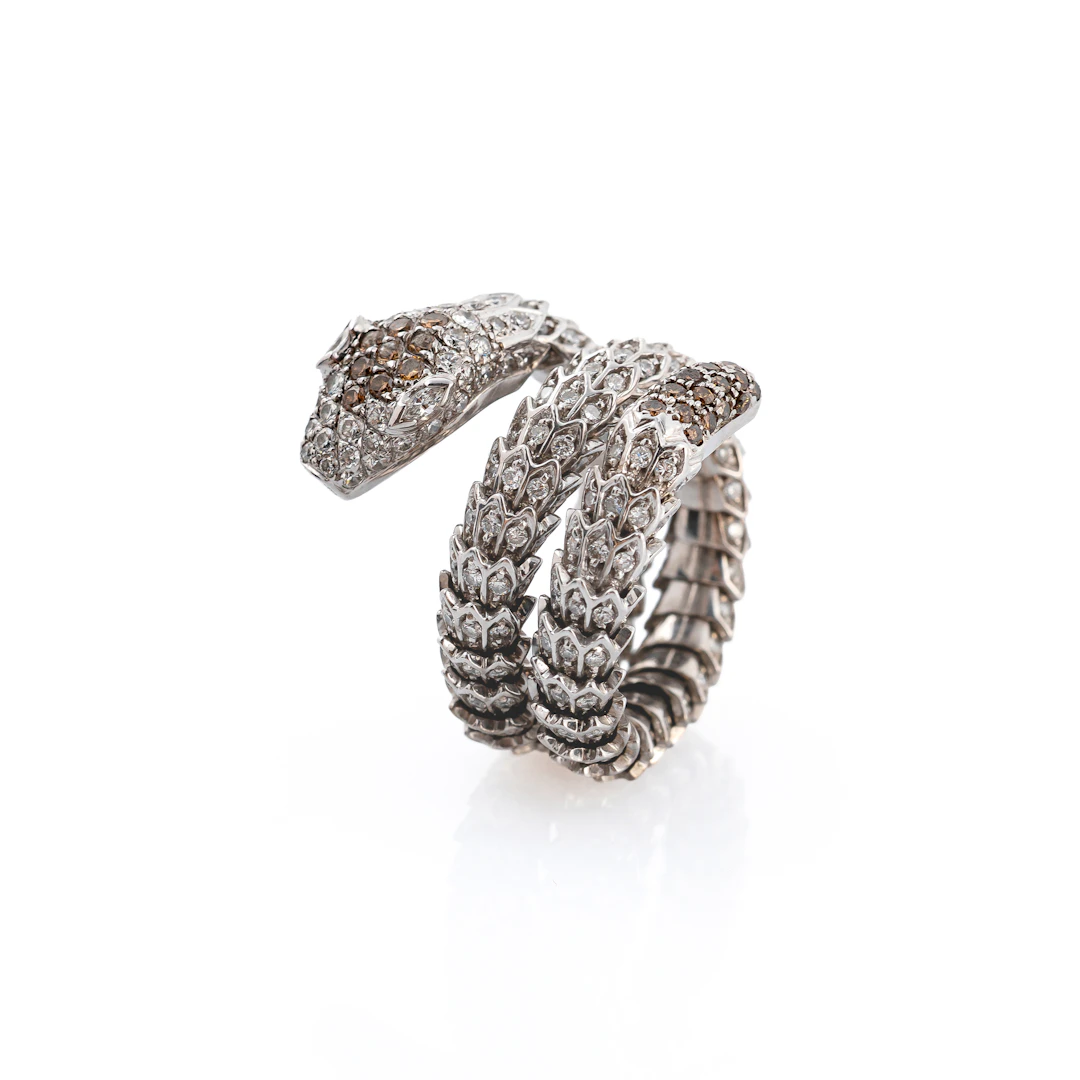 Anello a forma di Serpente flessibile con Diamanti. Oro giallo 18kt