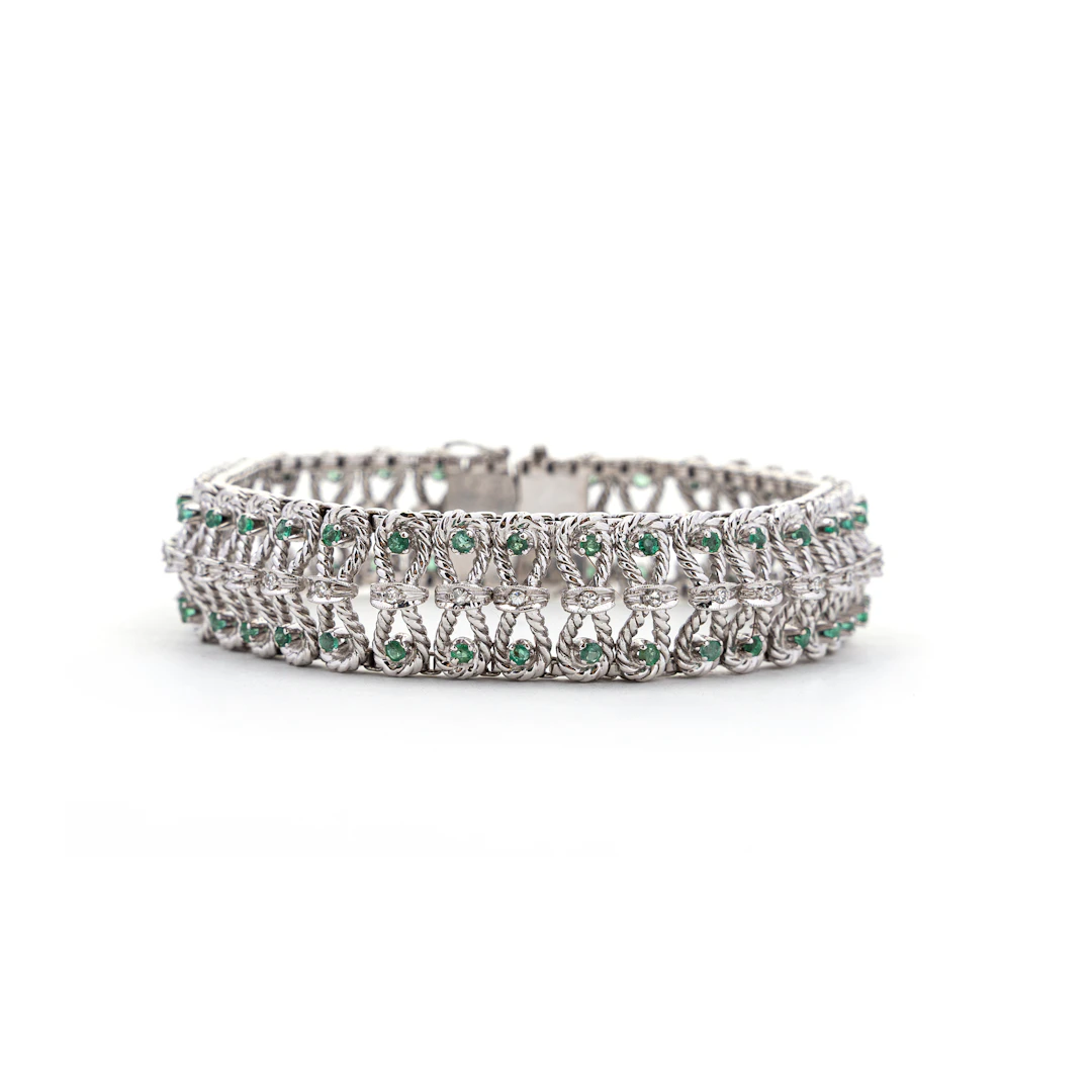 Bracciale con Smeraldi e Diamanti. Oro bianco 18kt, punzone dell'oro.