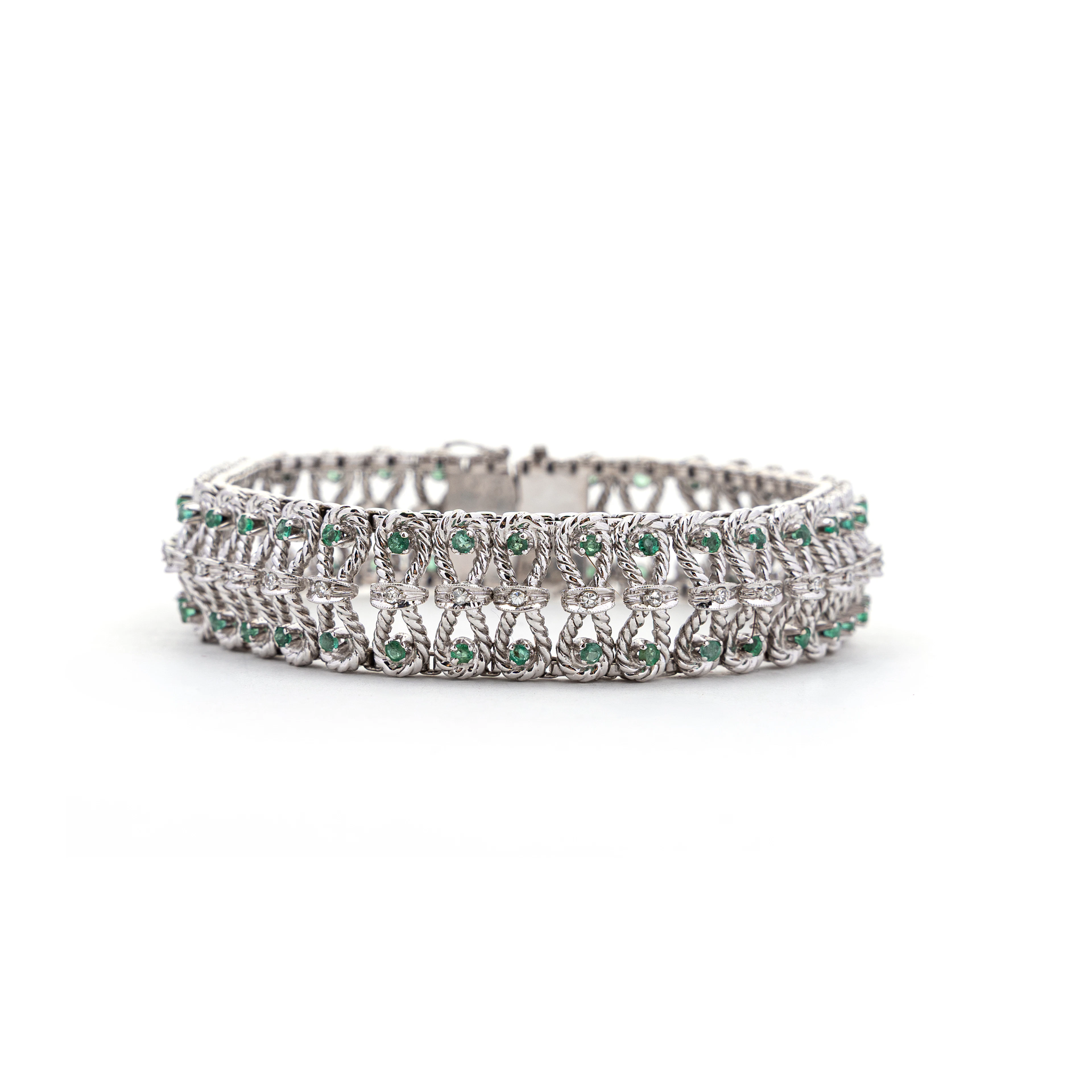 Bracciale con Smeraldi e Diamanti. Oro bianco 18kt, punzone dell'oro.