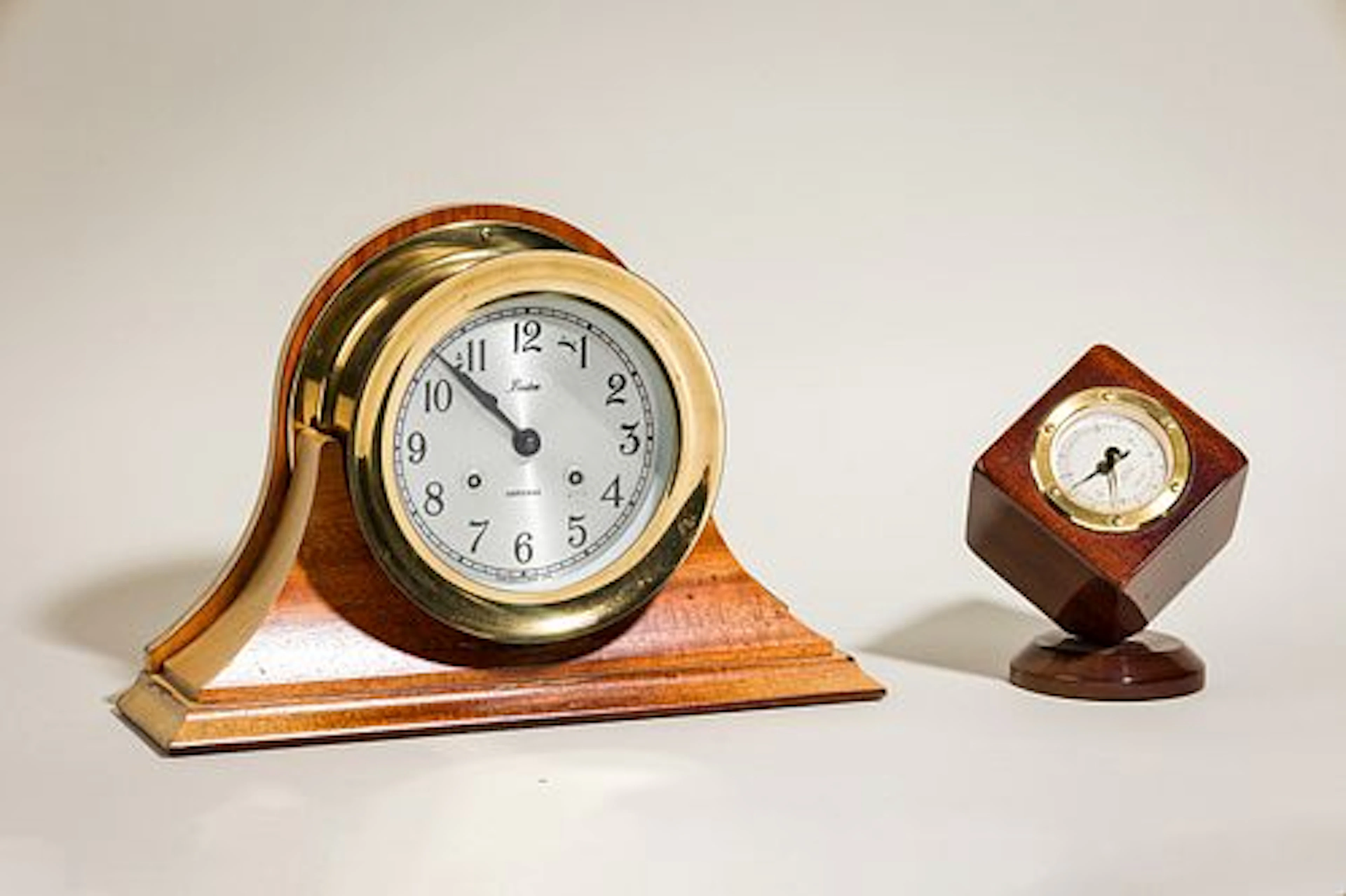 (2) tabletop nautical clocks/barometers
