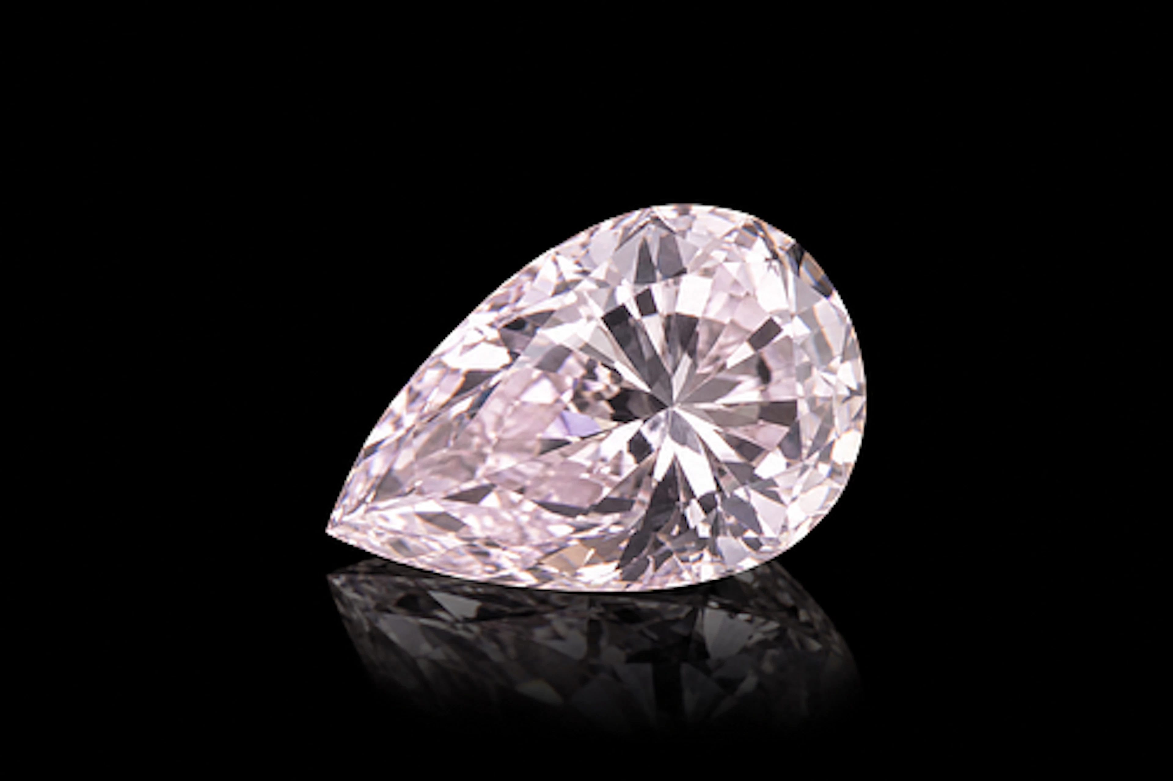 GIA Certified O.19 Ct Pear Brilliant Natural Very Light Pink Diamond