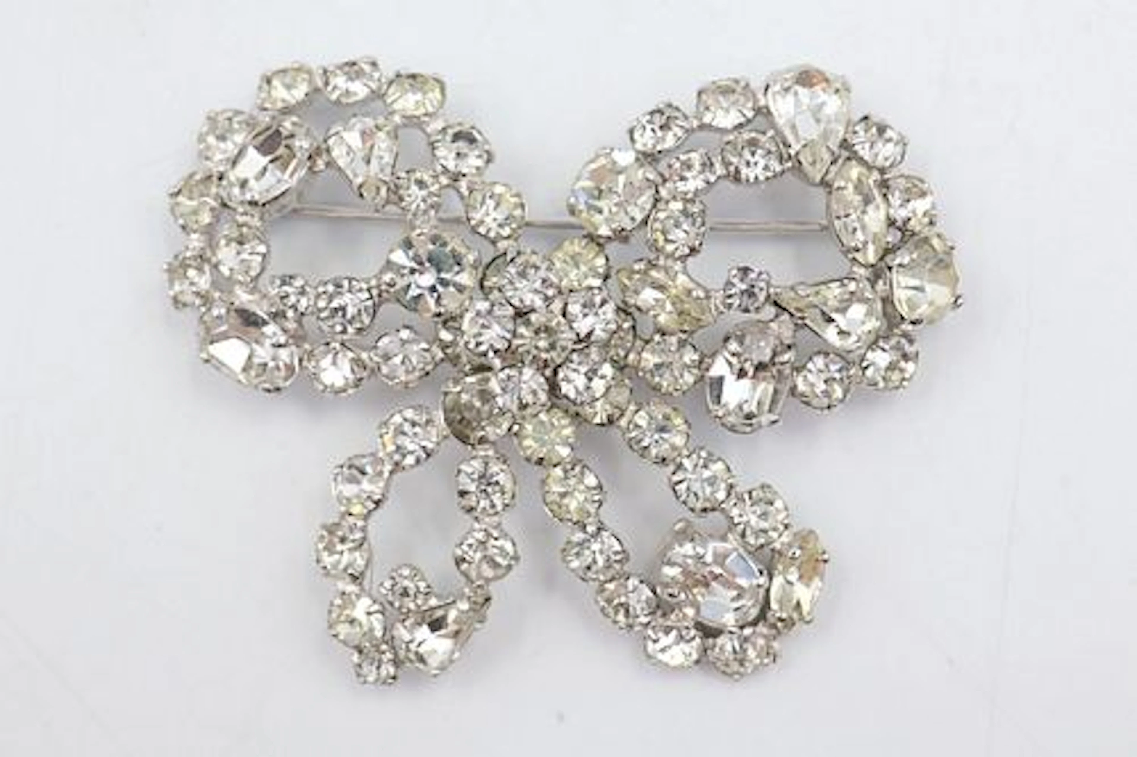 Sherman Bow Shaped Crystal Brooch