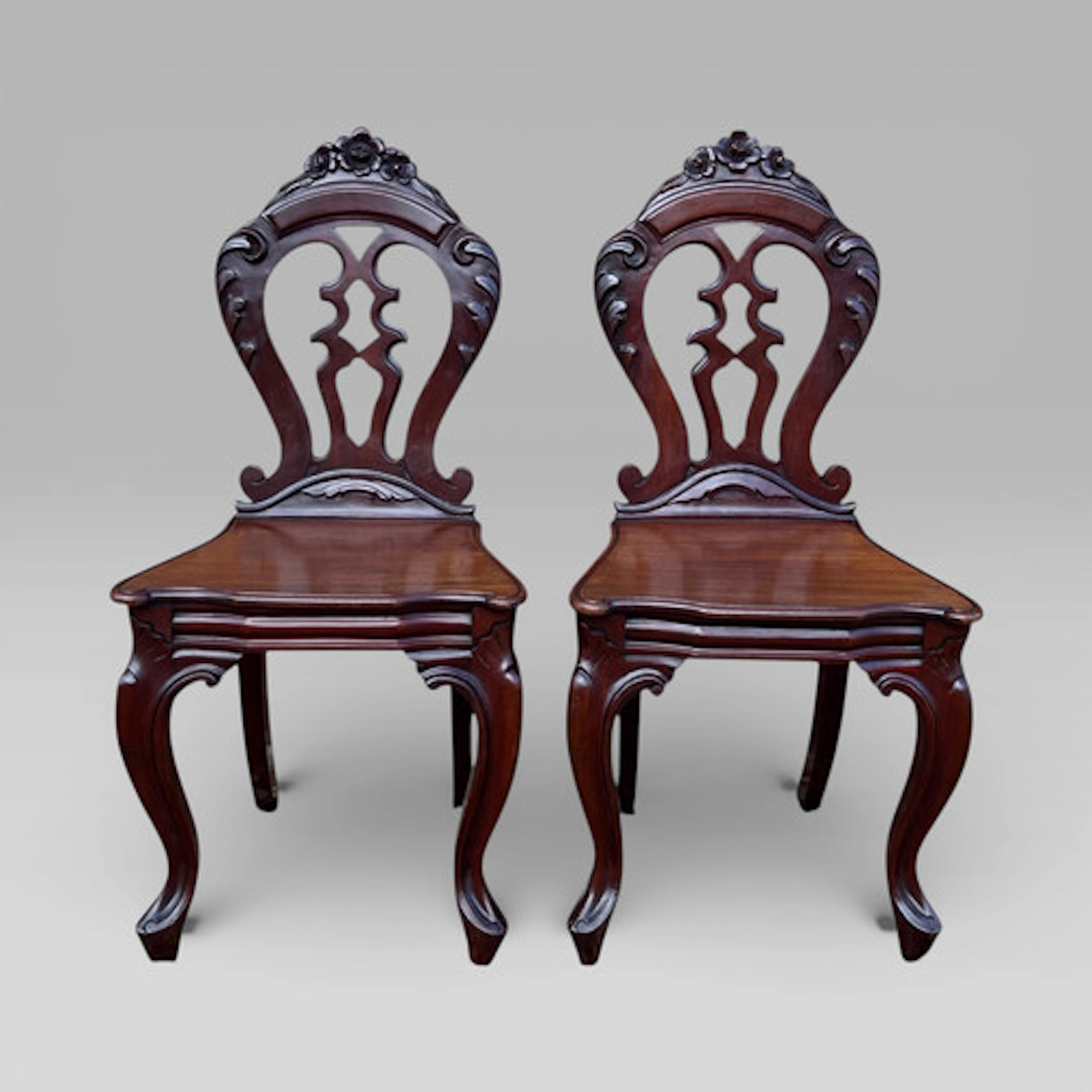 Pair of Victorian Carved Mahogany Hall Chairs