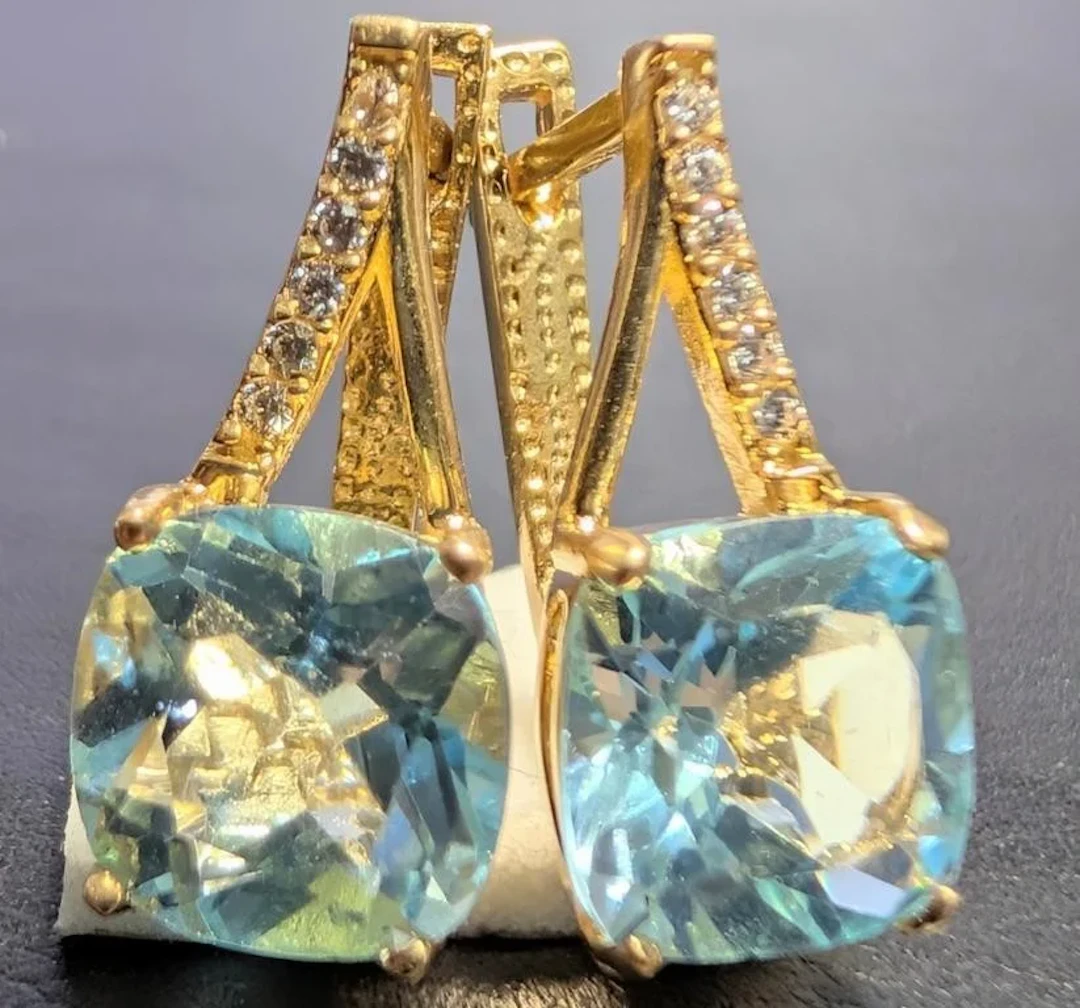 $3800, 10k(3.96g), blue topaz cz (3.5ct)earring, r