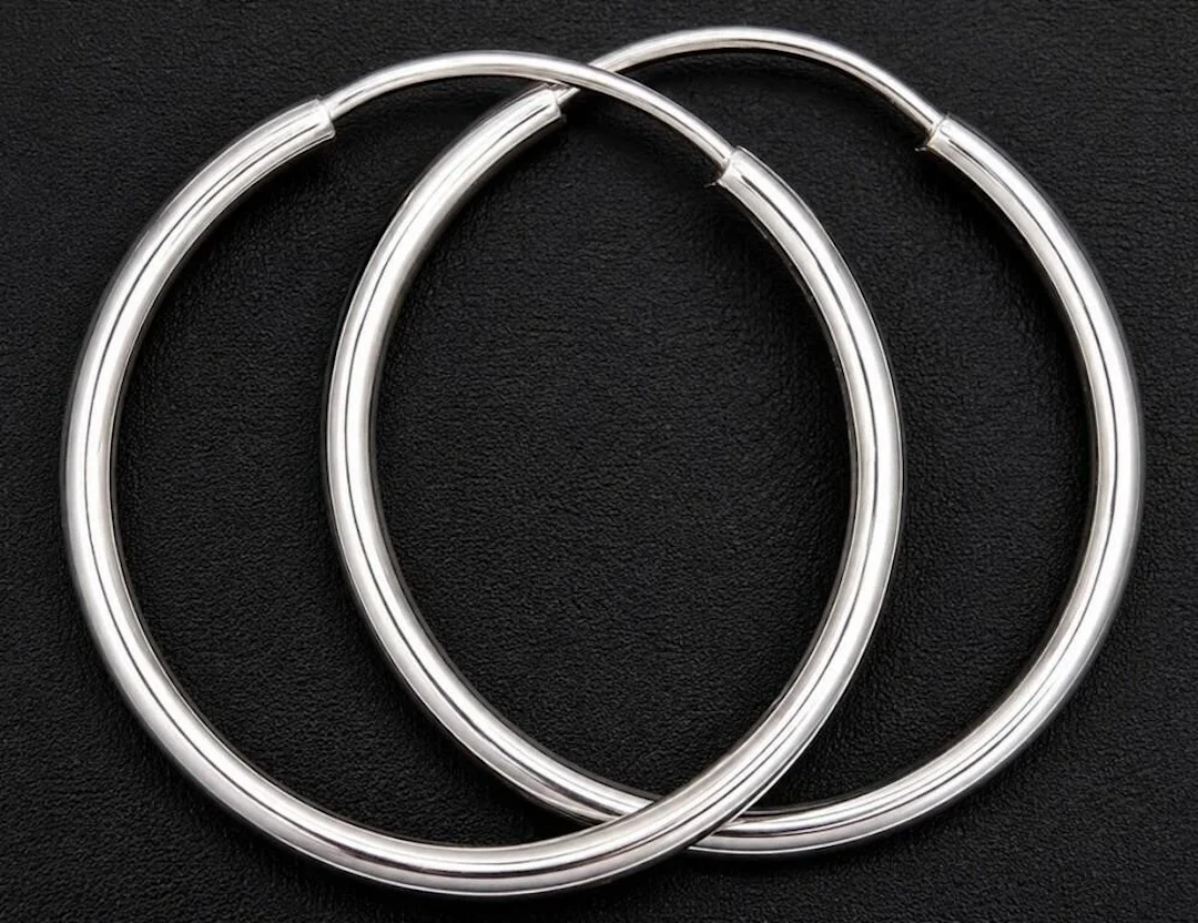 $800, 10k(1g), hoop earring, MSRP $800