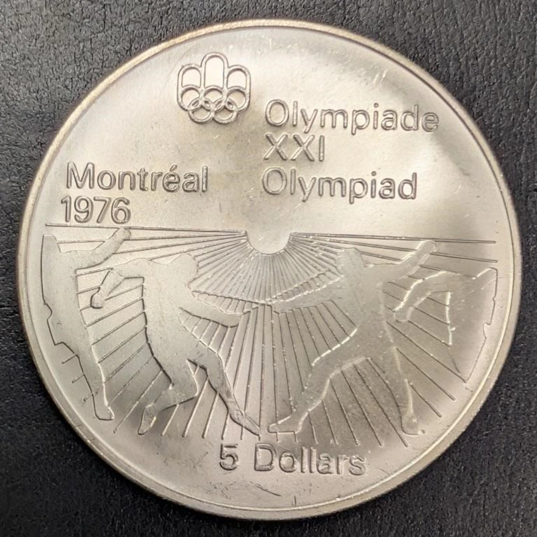 ., silver(24.47g), $5 olympic coin, retail value