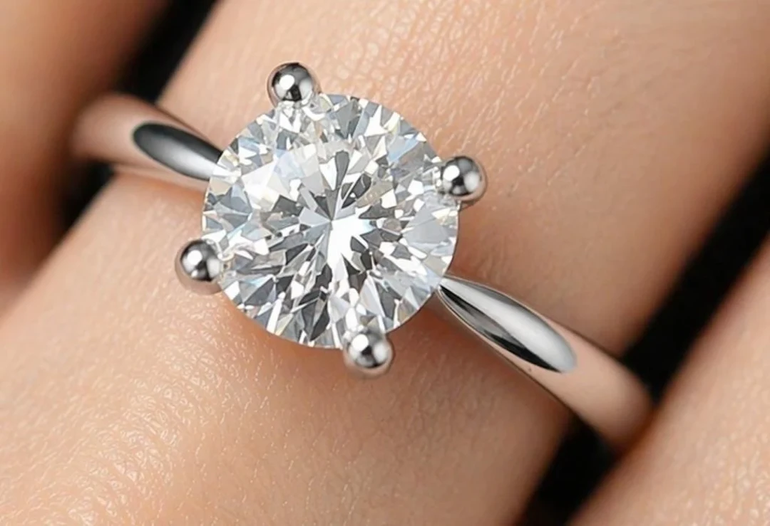 $6800, 10k(2.9g), natural diamond (1.1ct)ring, siz