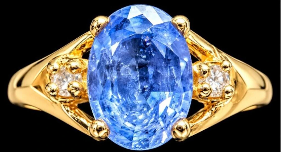 $1800, 10k(1.3g), sapphire (0.6ct), diamond (0.02c