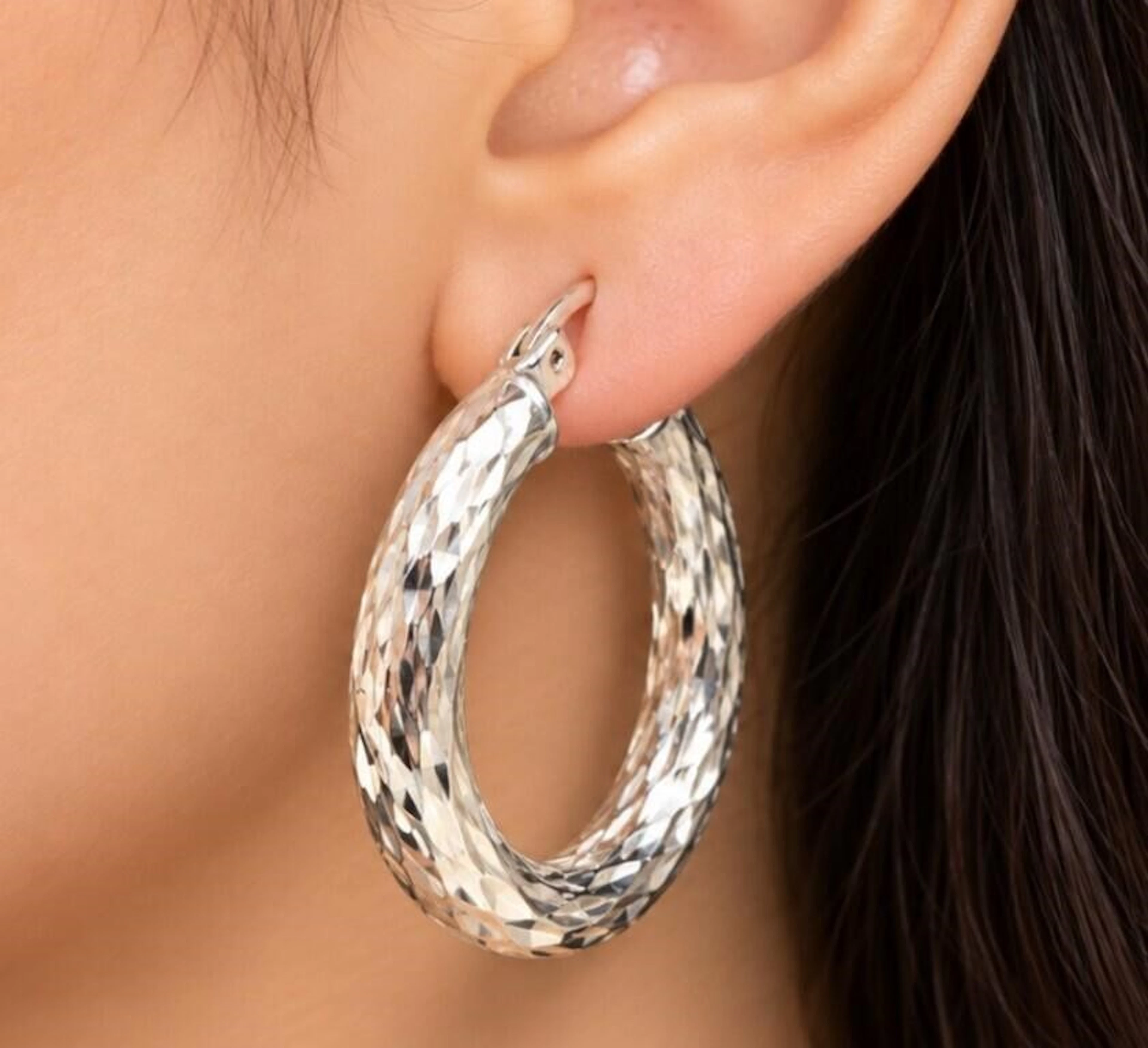 $100, silver(3.5g), hoopearring, retail value $10