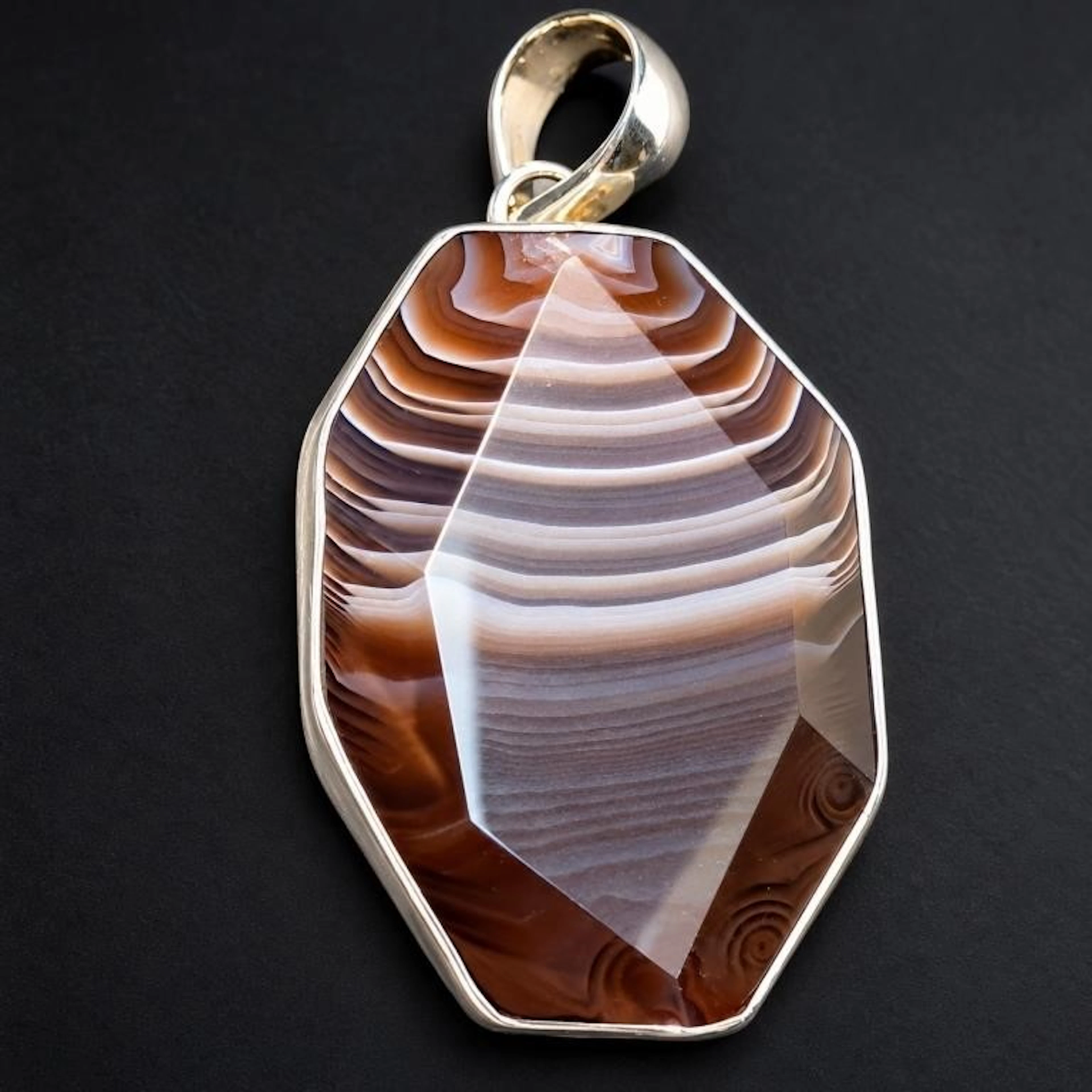 $250, silver (24.36g), agate pendant, retail value