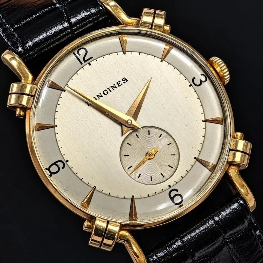 $1200, Vintage Longines gold-tone fancy scroll lug