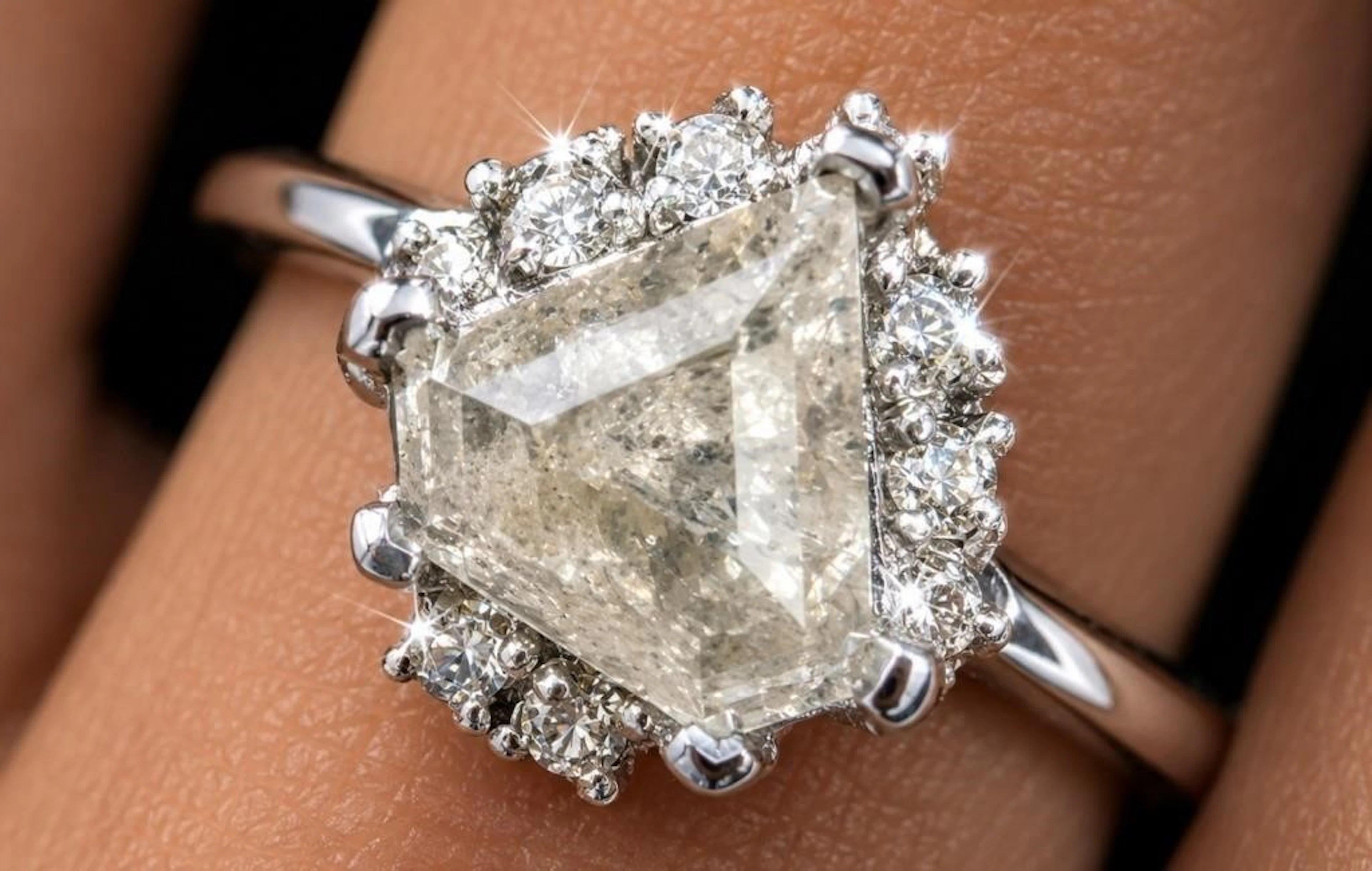 $4875, platinum(2.96g), natural color diamond (0.9