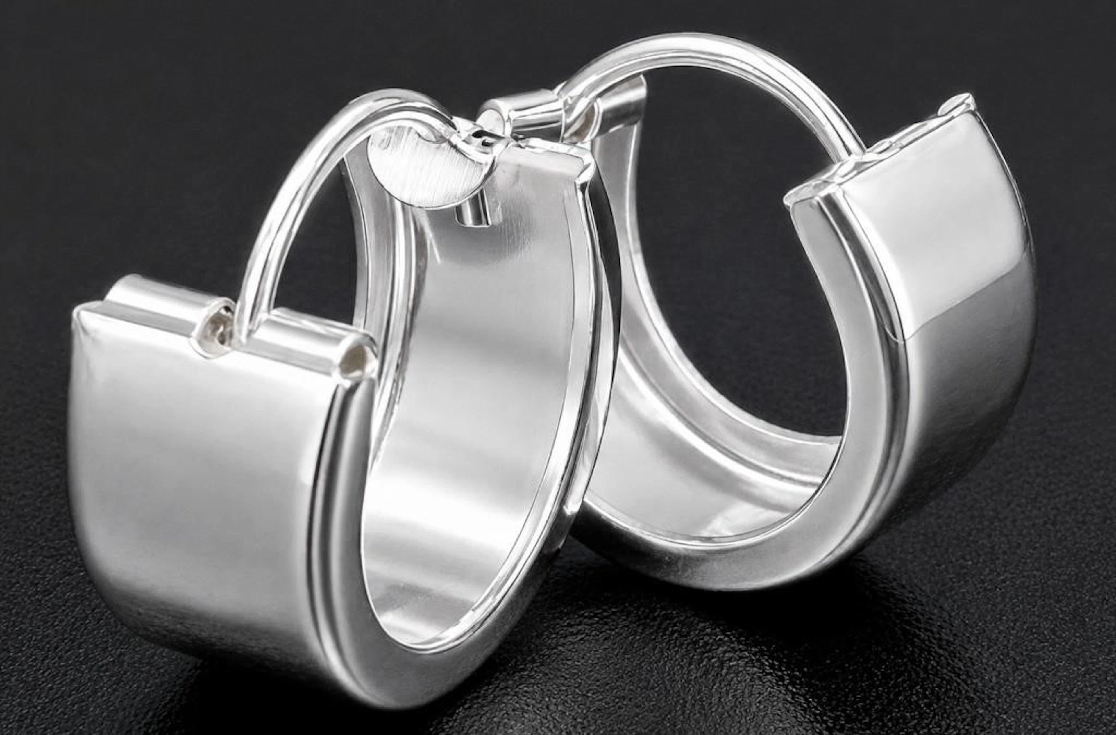 $50, silver small hoop earring, MSRP $50