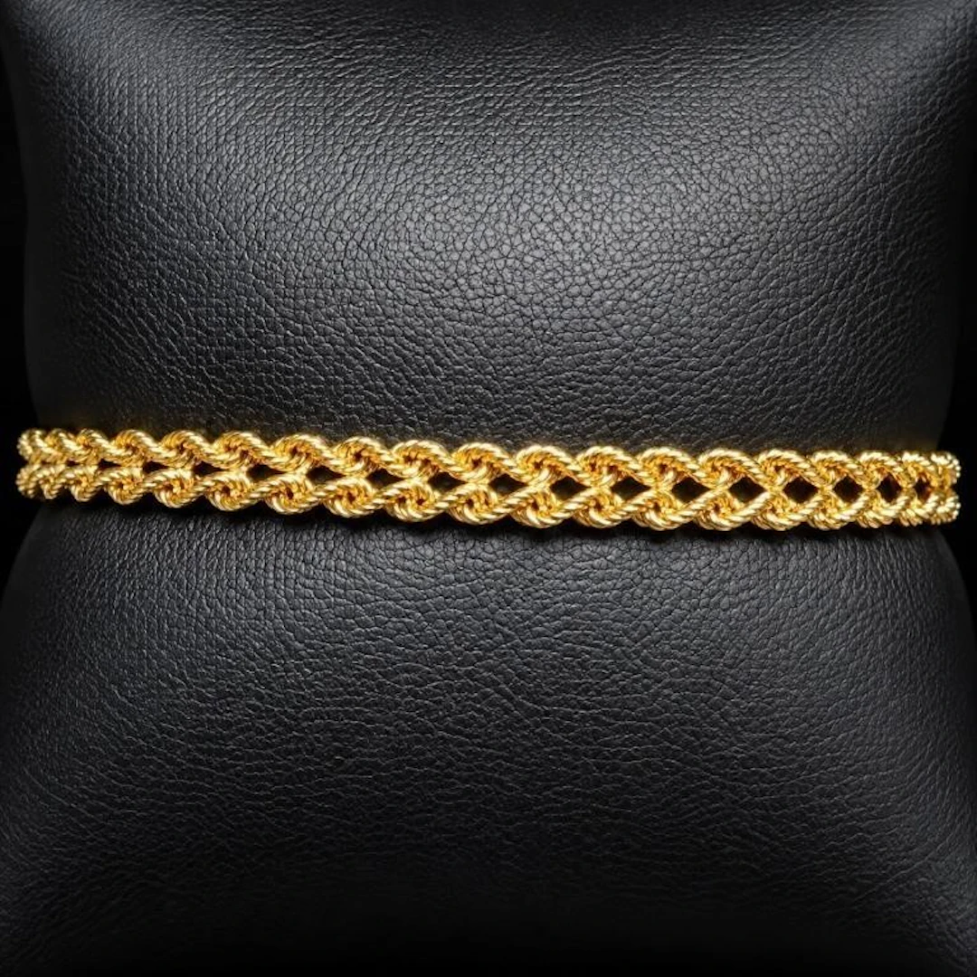 $1100, 10k(1.6g), bracelet 7", retail value $1100