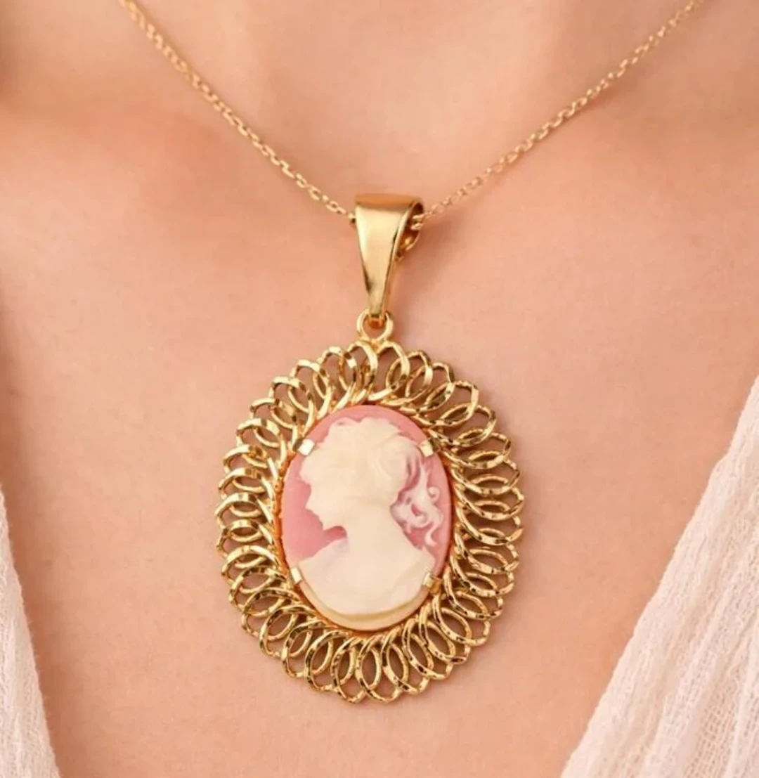 $2250, 10K(4.51g), cameo pendant, retail value $2