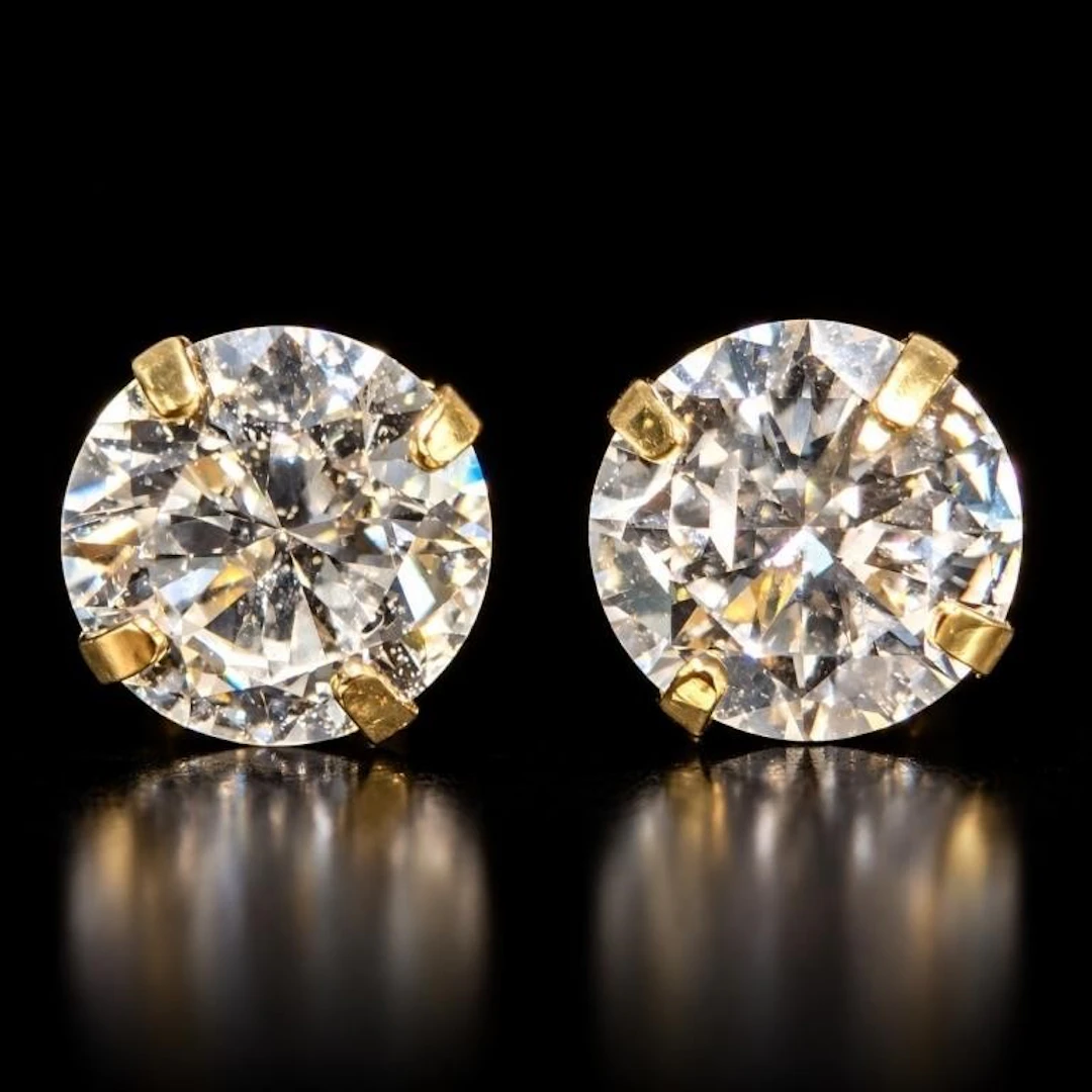 $700, 14k lab diamond (0.42ct) earring, retail val