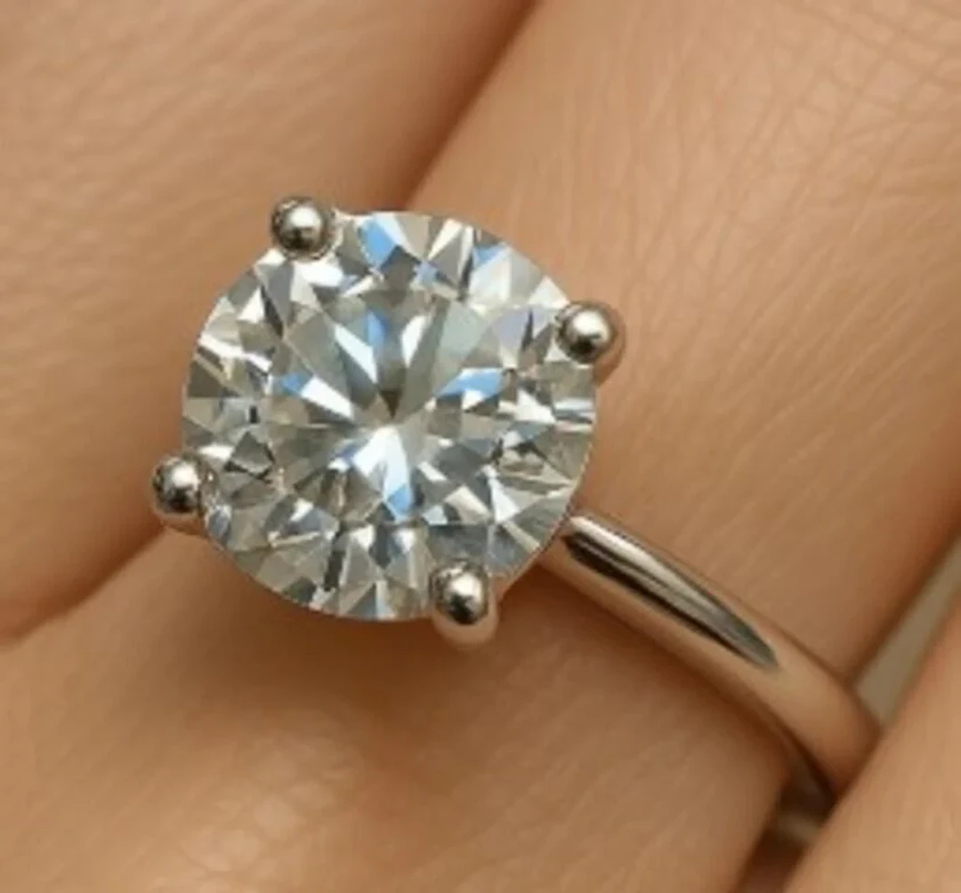 $3130, 14k(3.58g), moissanite (2ct)ring, size 6, a