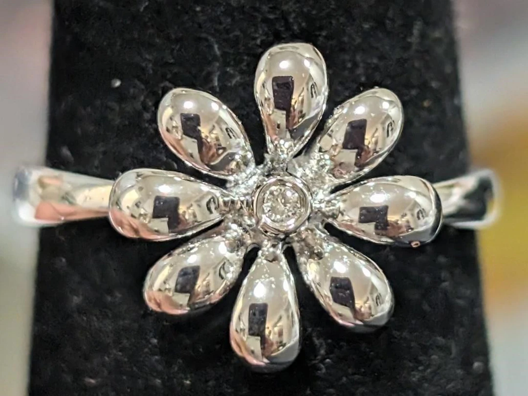 $70, SilverRhodium plated diamondRing, size 4, app