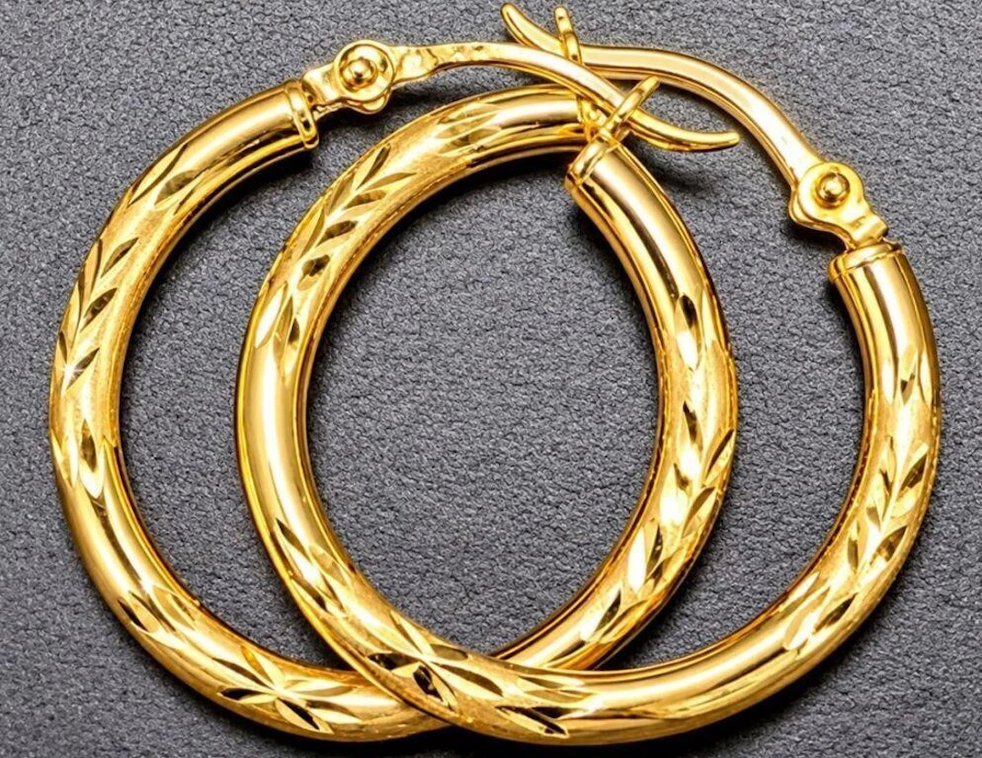 $500, 10k(0.75g), earring, retail value $500