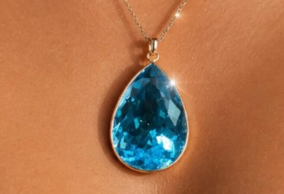$1600, 10k(3.66g), blue topaz (17ct)pendant, retai