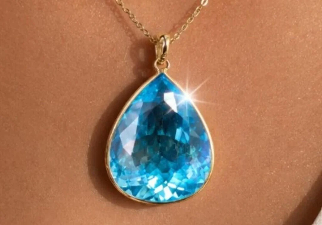 $1800, 10k(3.67g), blue topaz (17.2ct)penadant, re