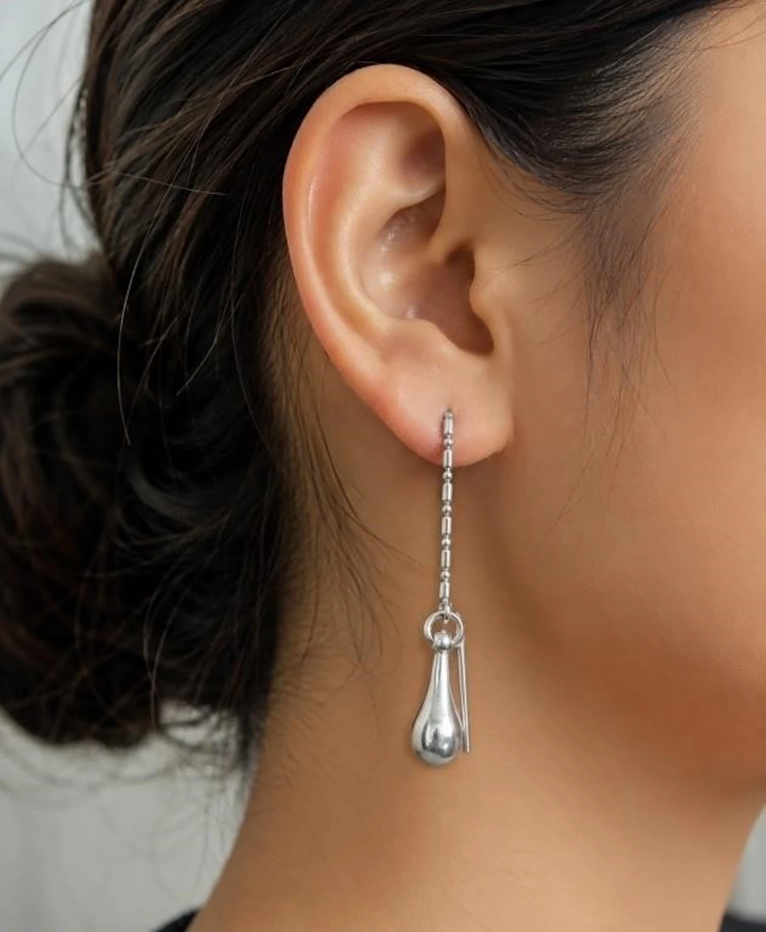 $100, silver(3g), earring, retail value $100