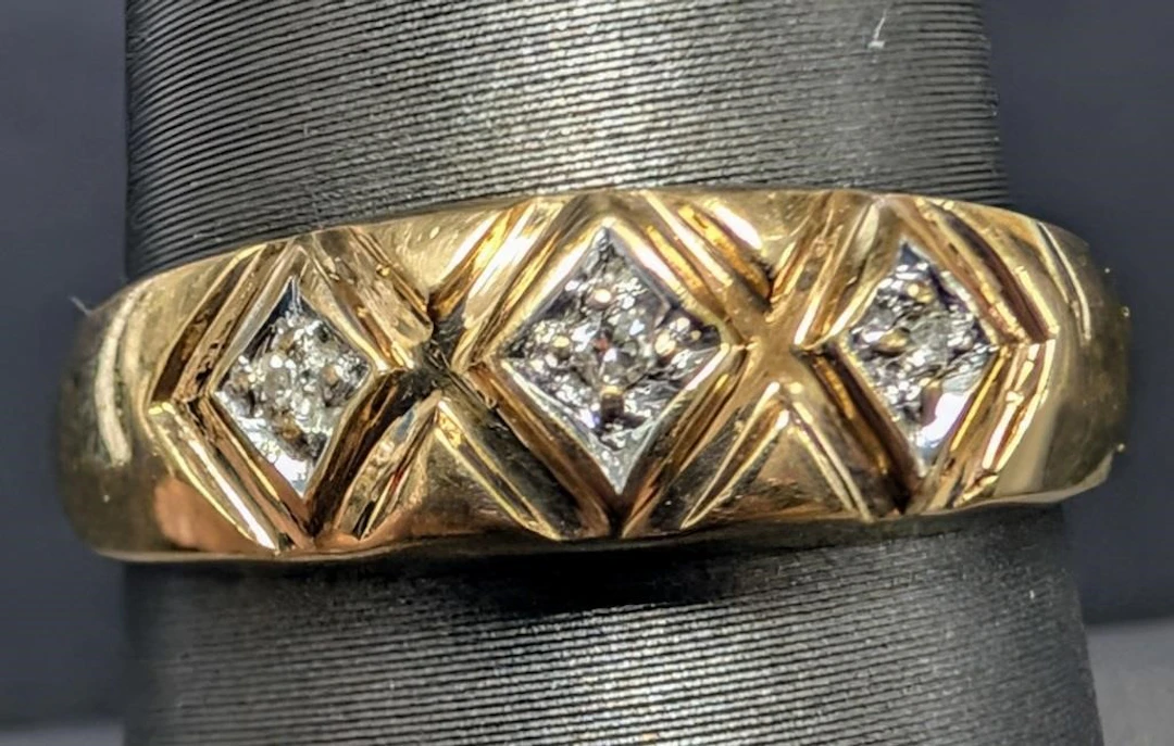 $1400, 10k(1.85g), diamond (0.03ct)ring, size 8.