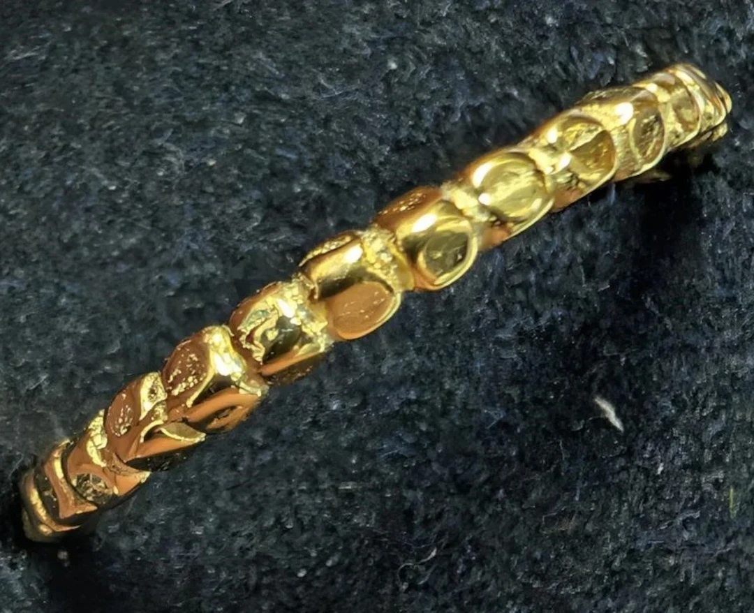 $50, gold plated ring., retail value $50