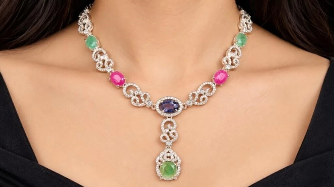 $2800, silver(33.9g), ruby, sapphire, emerald (29c