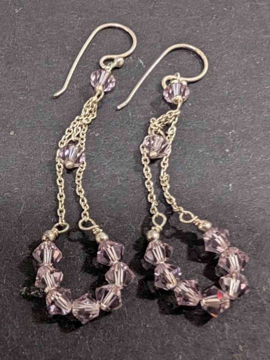 $20, earring, appraised/retail value $20
