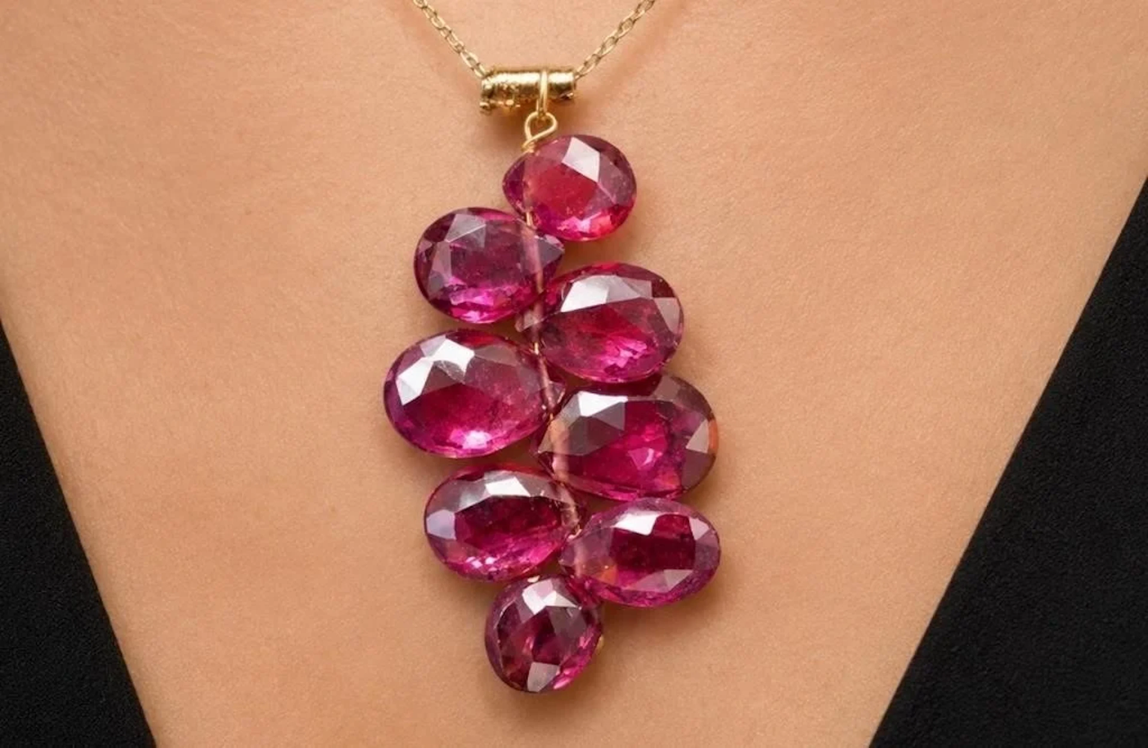 $400, 10k(1.5g), garnet (grape design) (8ct)pendan