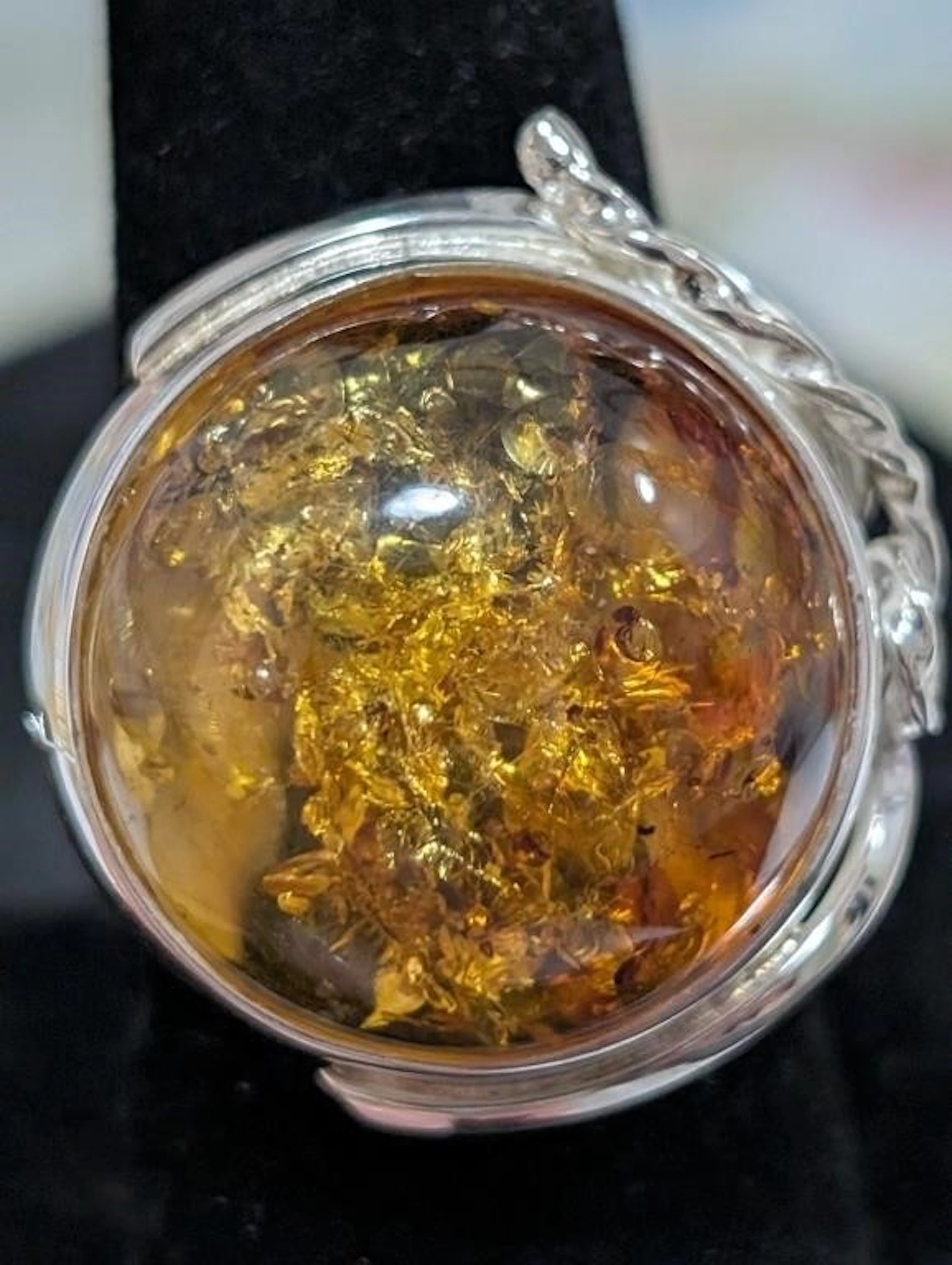 $255, Silver(10.14g), amberRing, size 7, appraised