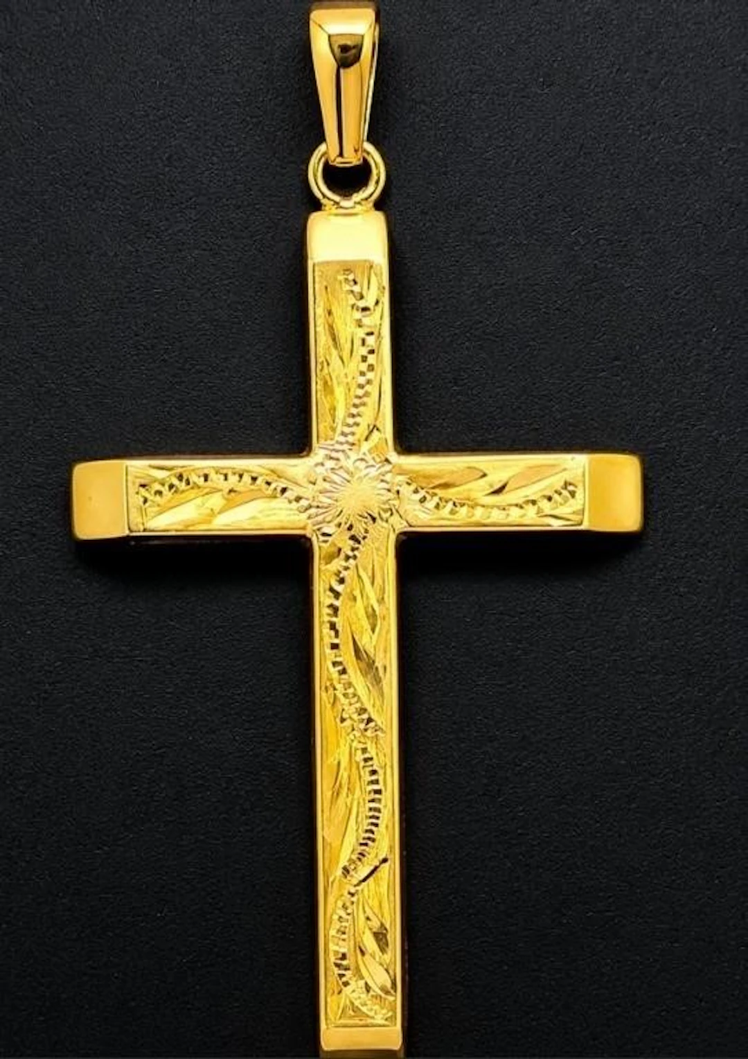 $620, 9k(1.08g), cross pendant, retail value $62