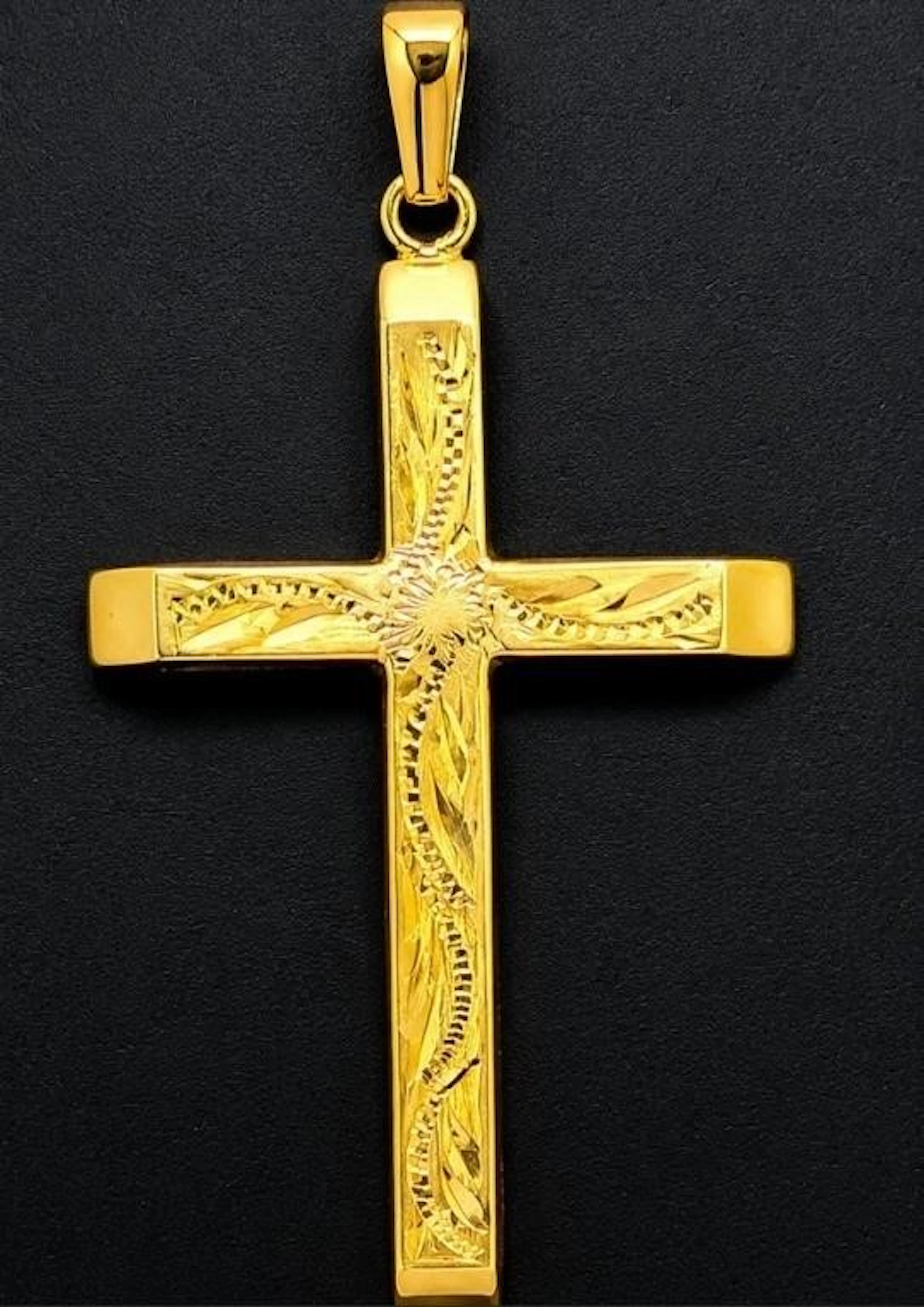 $620, 9k(1.08g), cross pendant, retail value $62