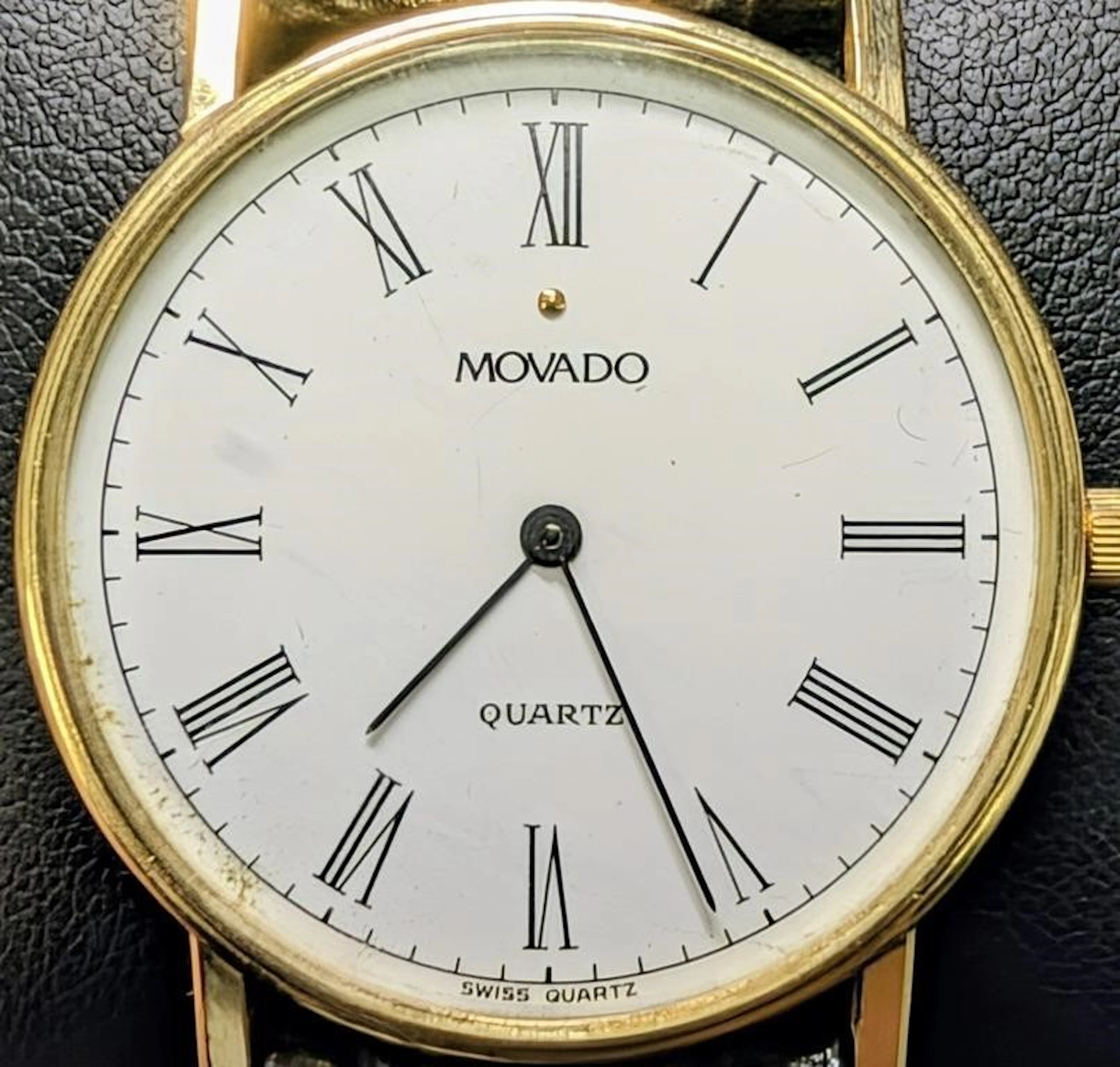 $3800, Movado 14K Gold(22g with strap) 30.5mm Quar